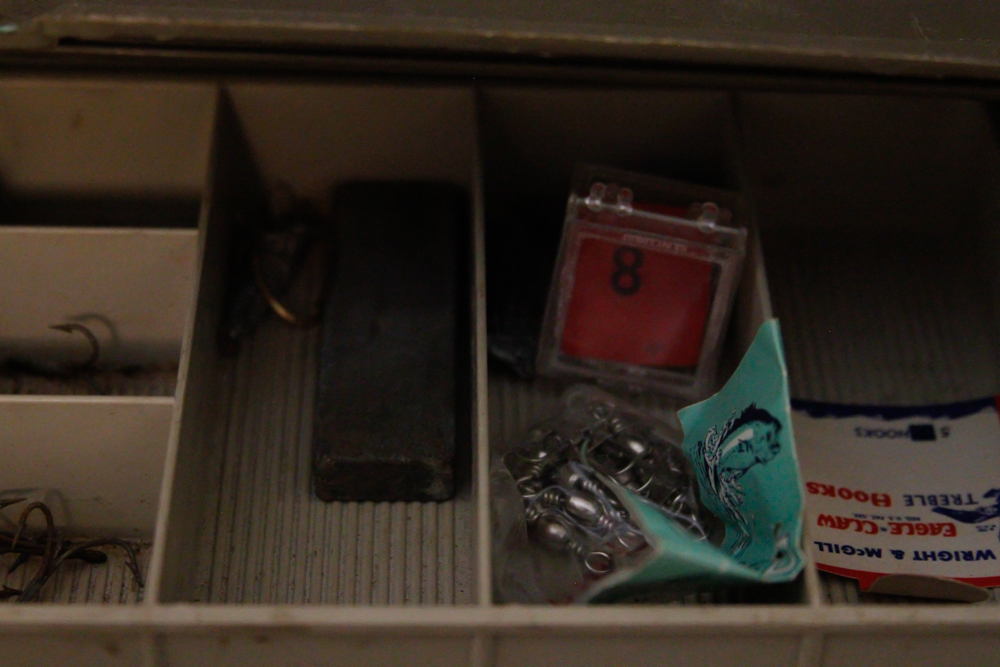 Assorted Fishing Supplies in Tackle Box