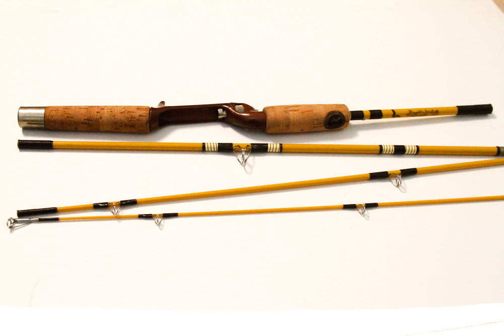 Assorted Fishing Supplies in Tackle Box