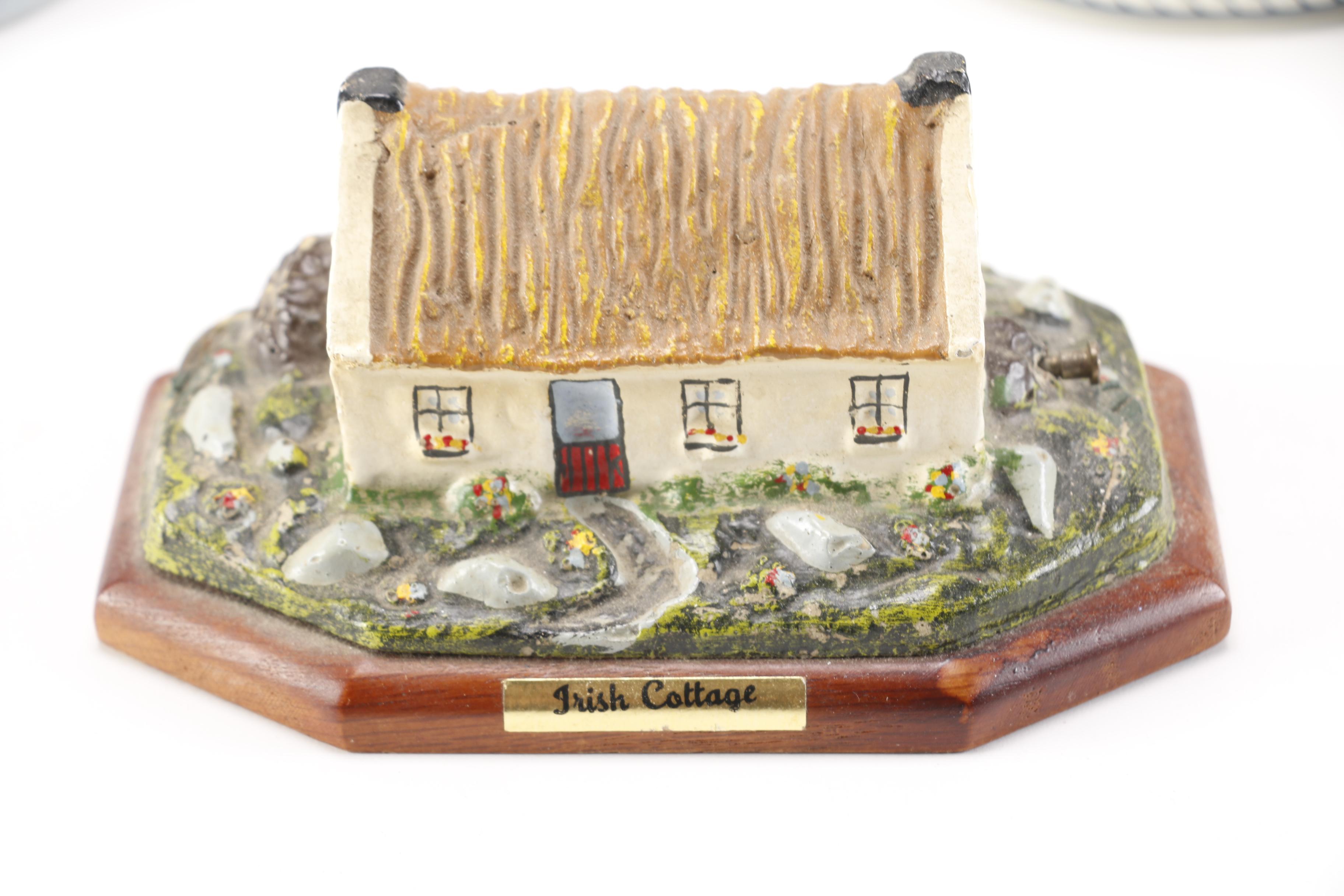 Decorative Village Accessories and Steins Featuring Avon