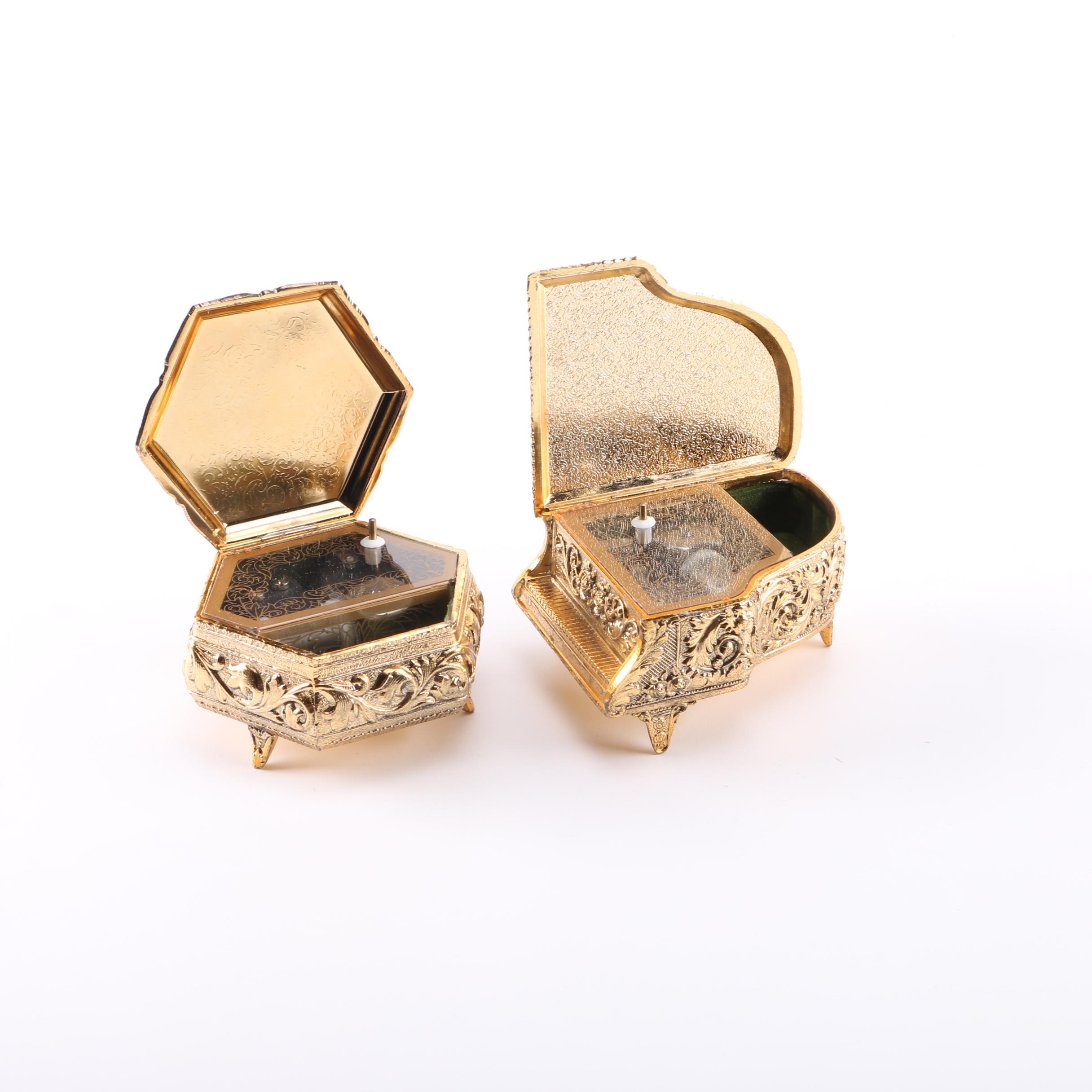 Two Gold Tone Musical Jewelry Boxes