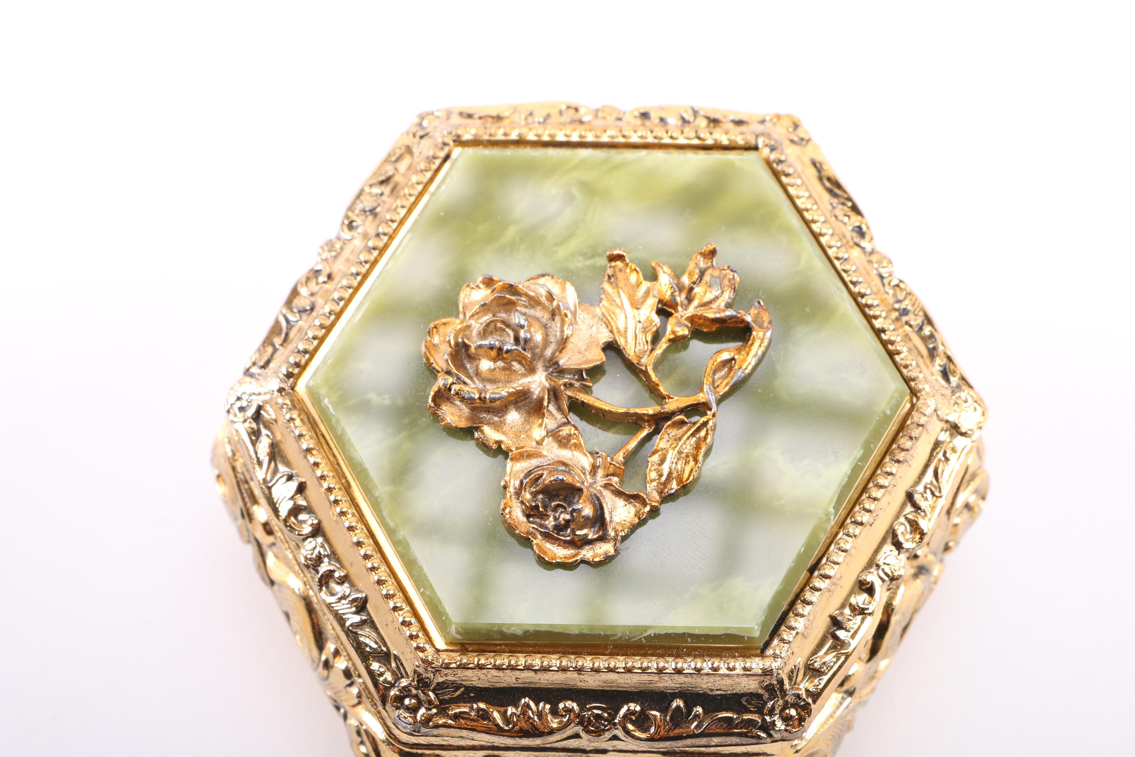 Two Gold Tone Musical Jewelry Boxes