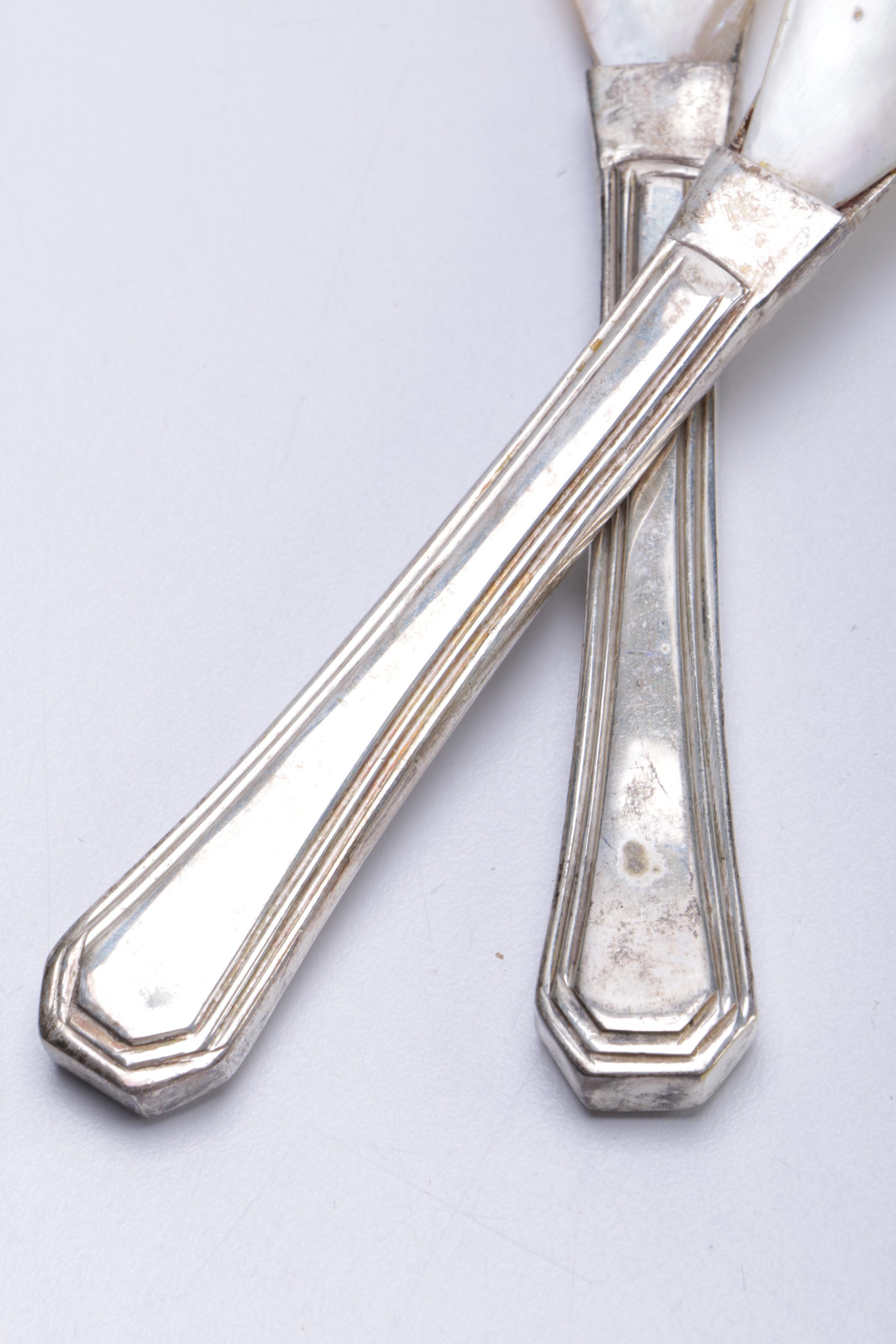 Shell and Metal Spoons