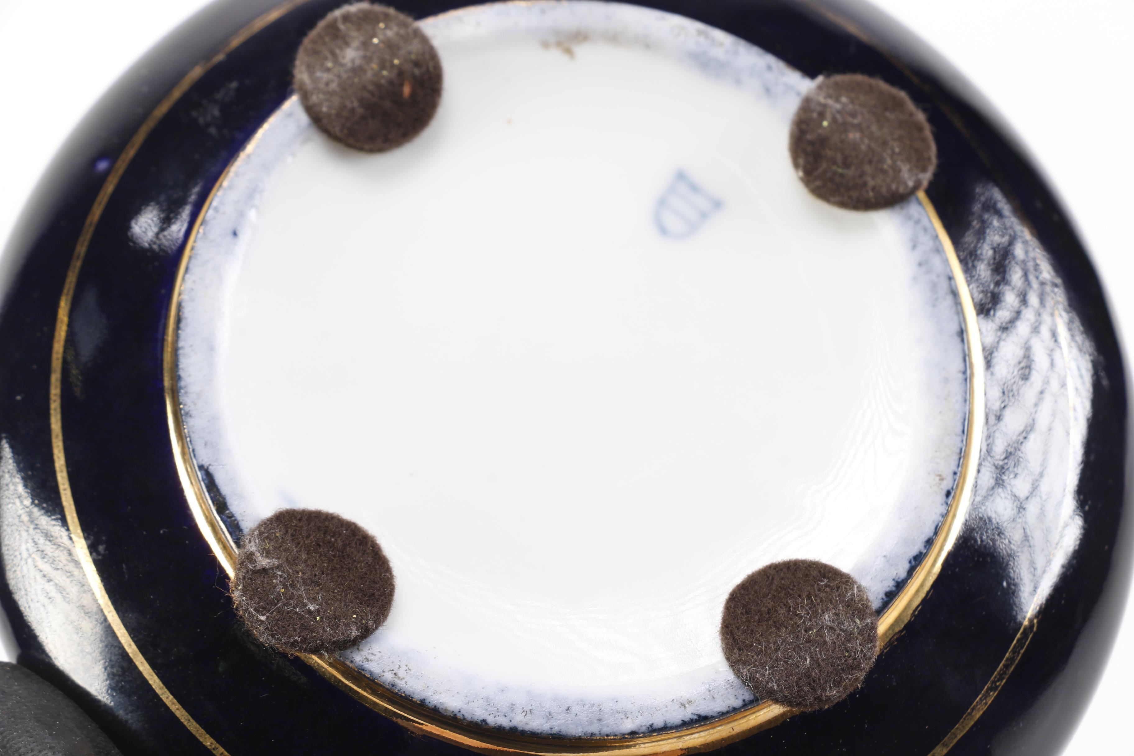 Porcelain Vase, Plate, and Powder Box