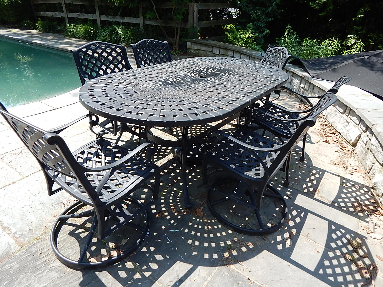 Cast Iron Patio Table and Six Chairs