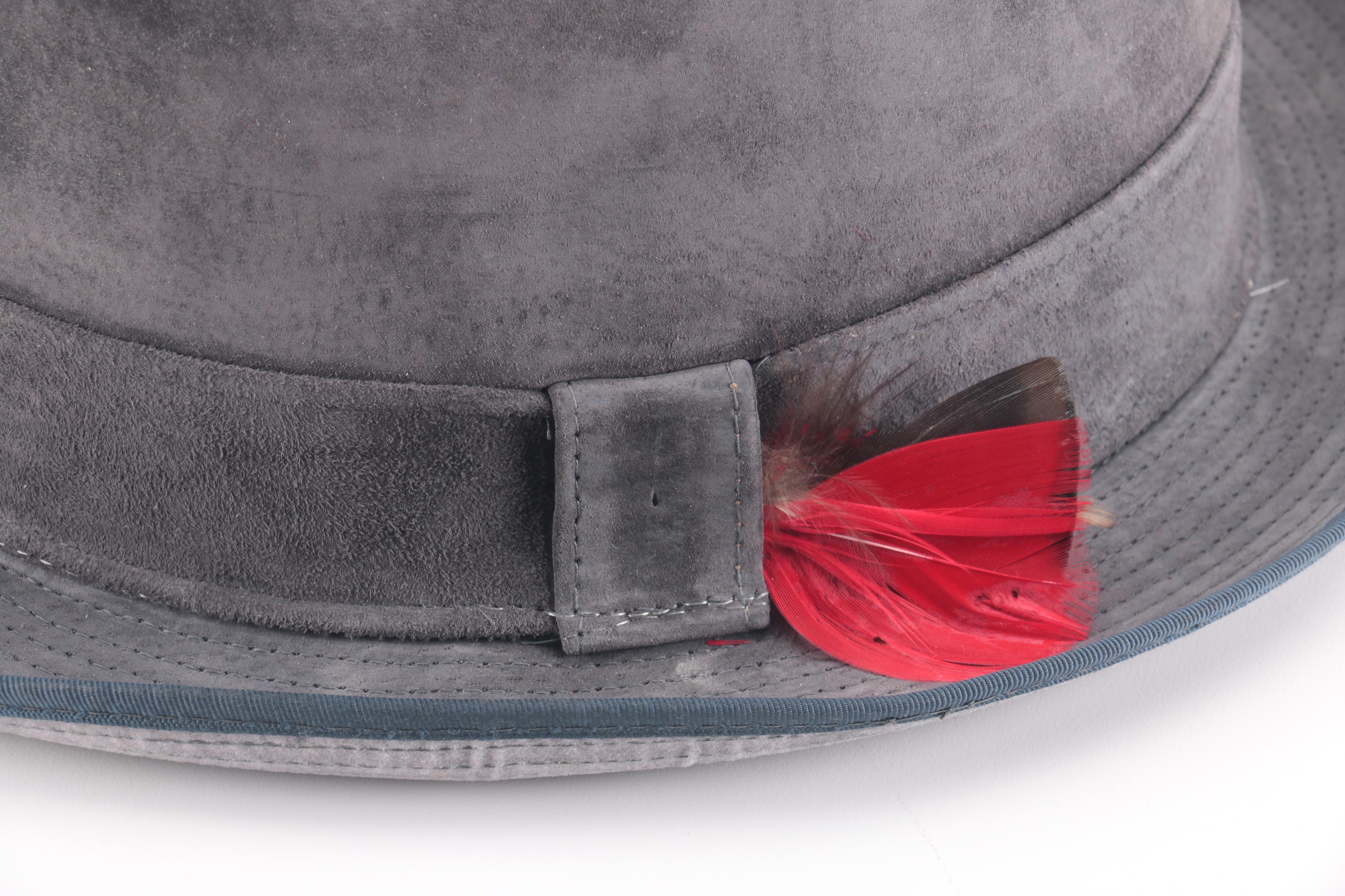 Three Black, Brown, And Gray Suede Fedoras