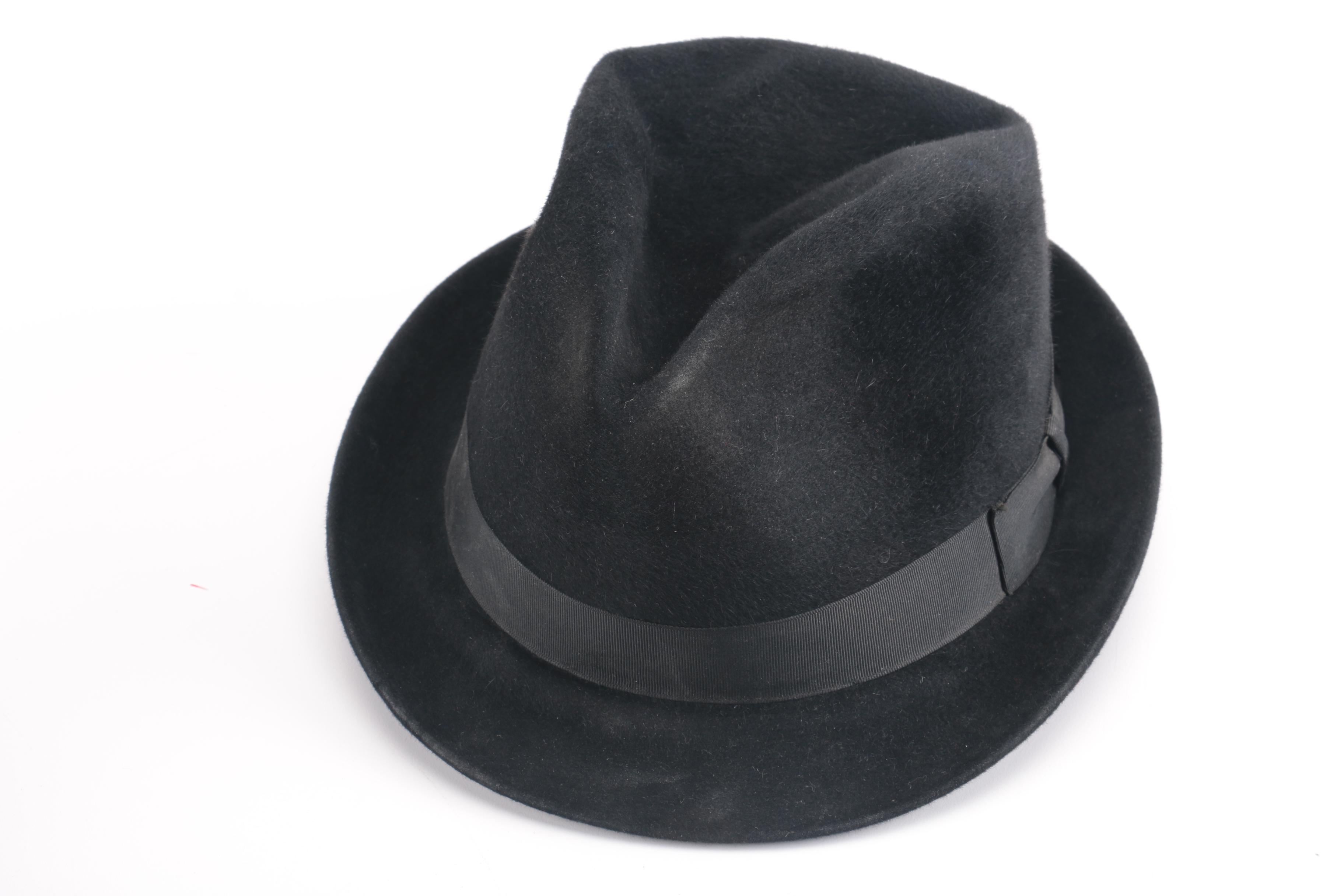 Three Black, Brown, And Gray Suede Fedoras