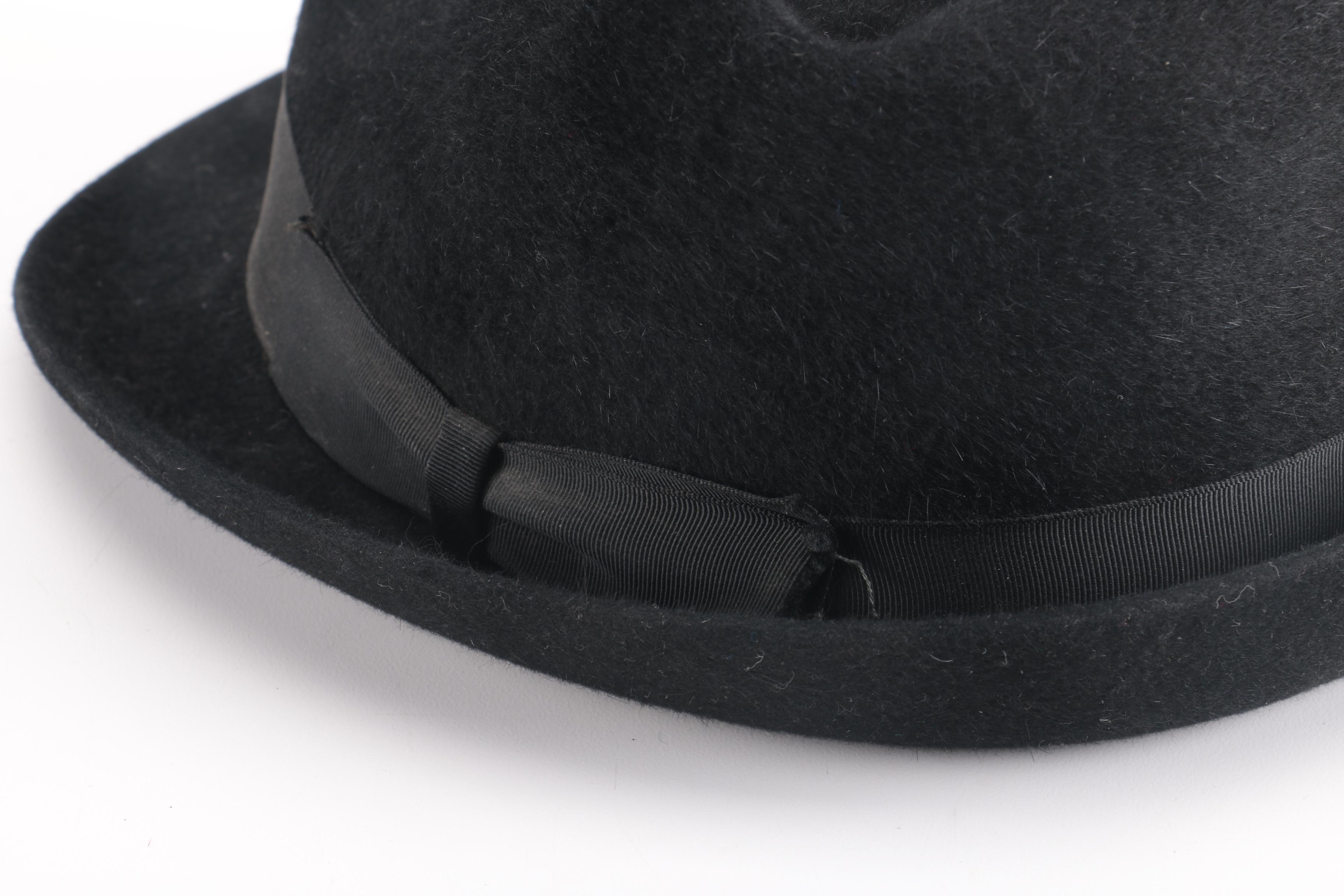 Three Black, Brown, And Gray Suede Fedoras
