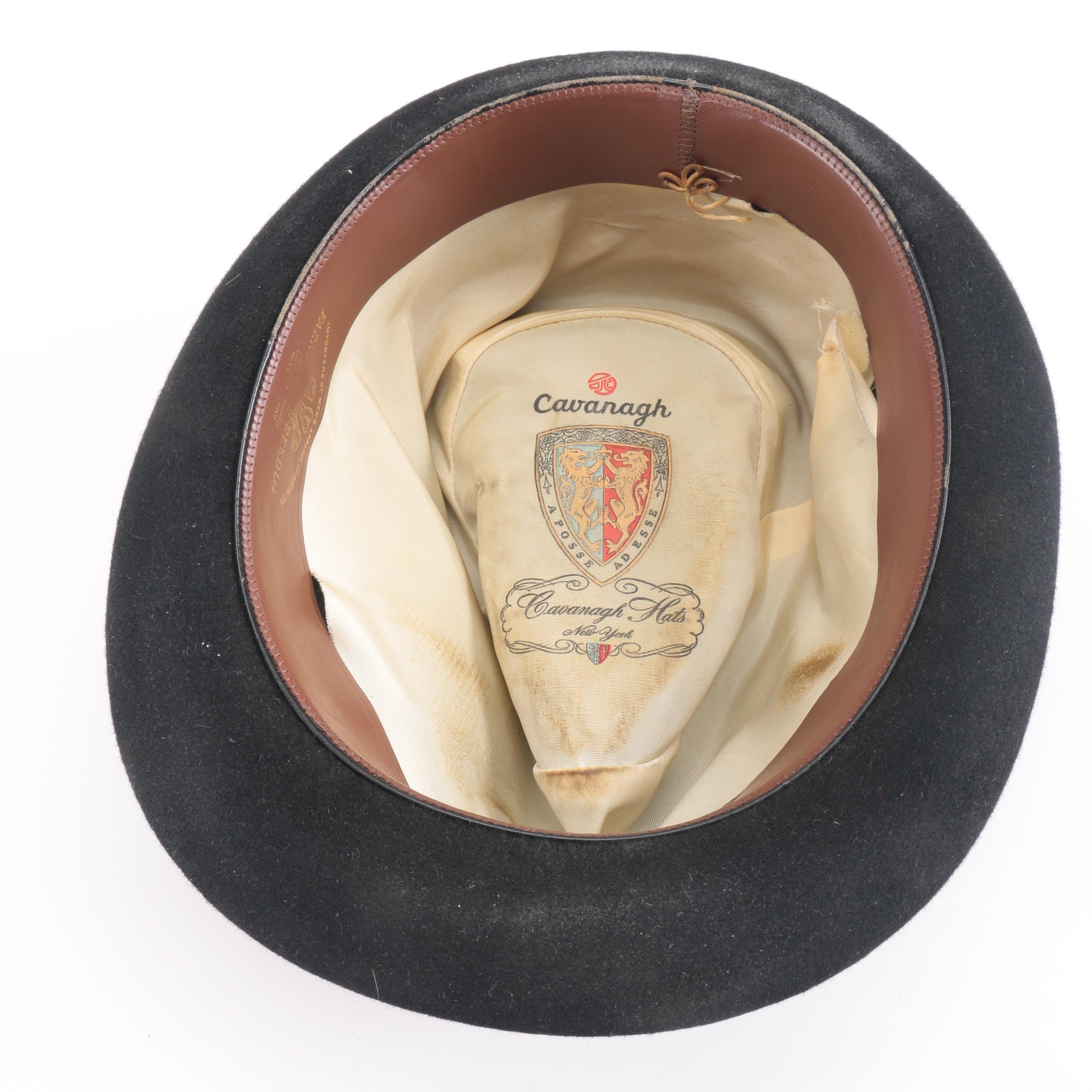 Three Black, Brown, And Gray Suede Fedoras