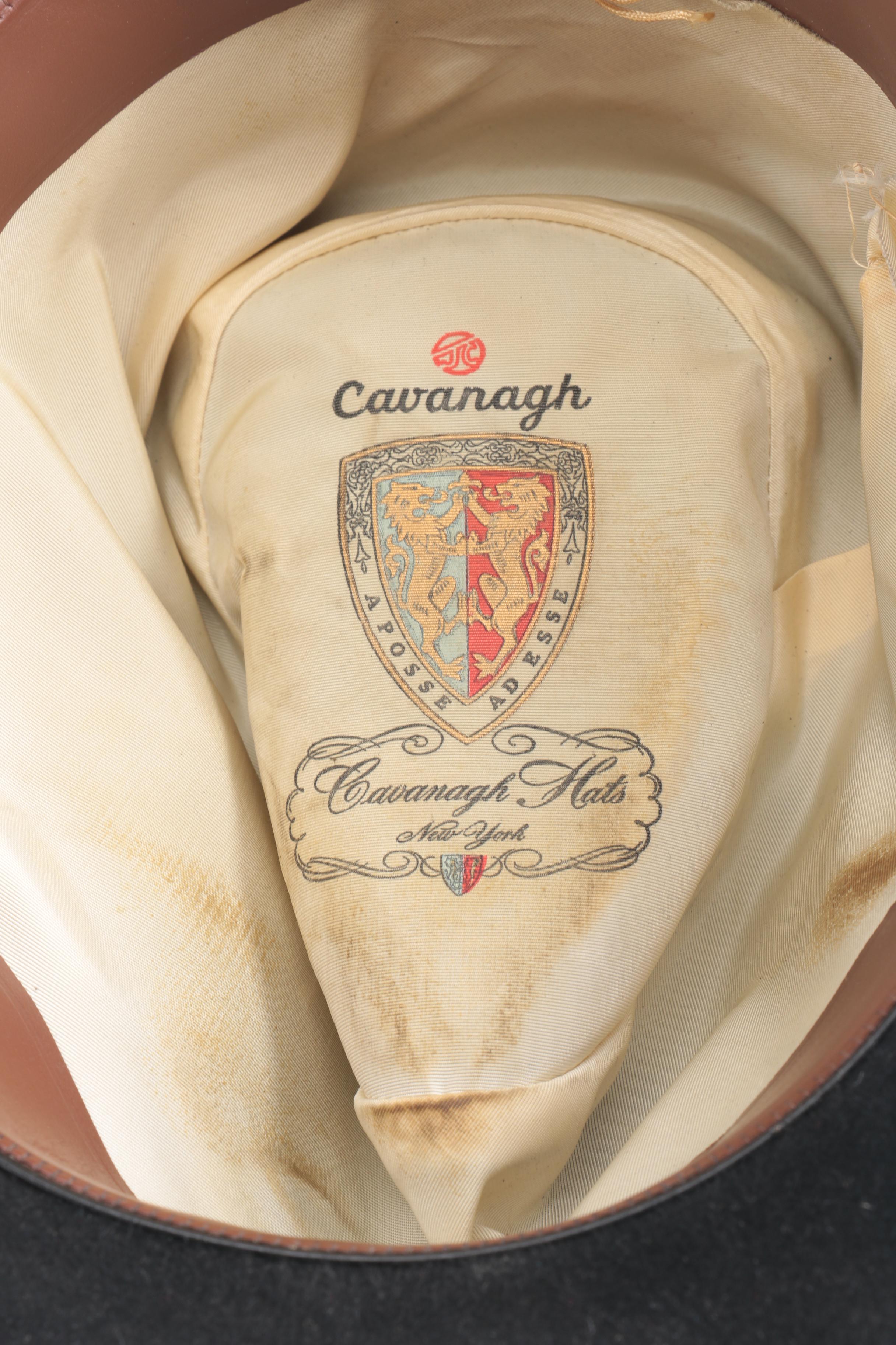 Three Black, Brown, And Gray Suede Fedoras