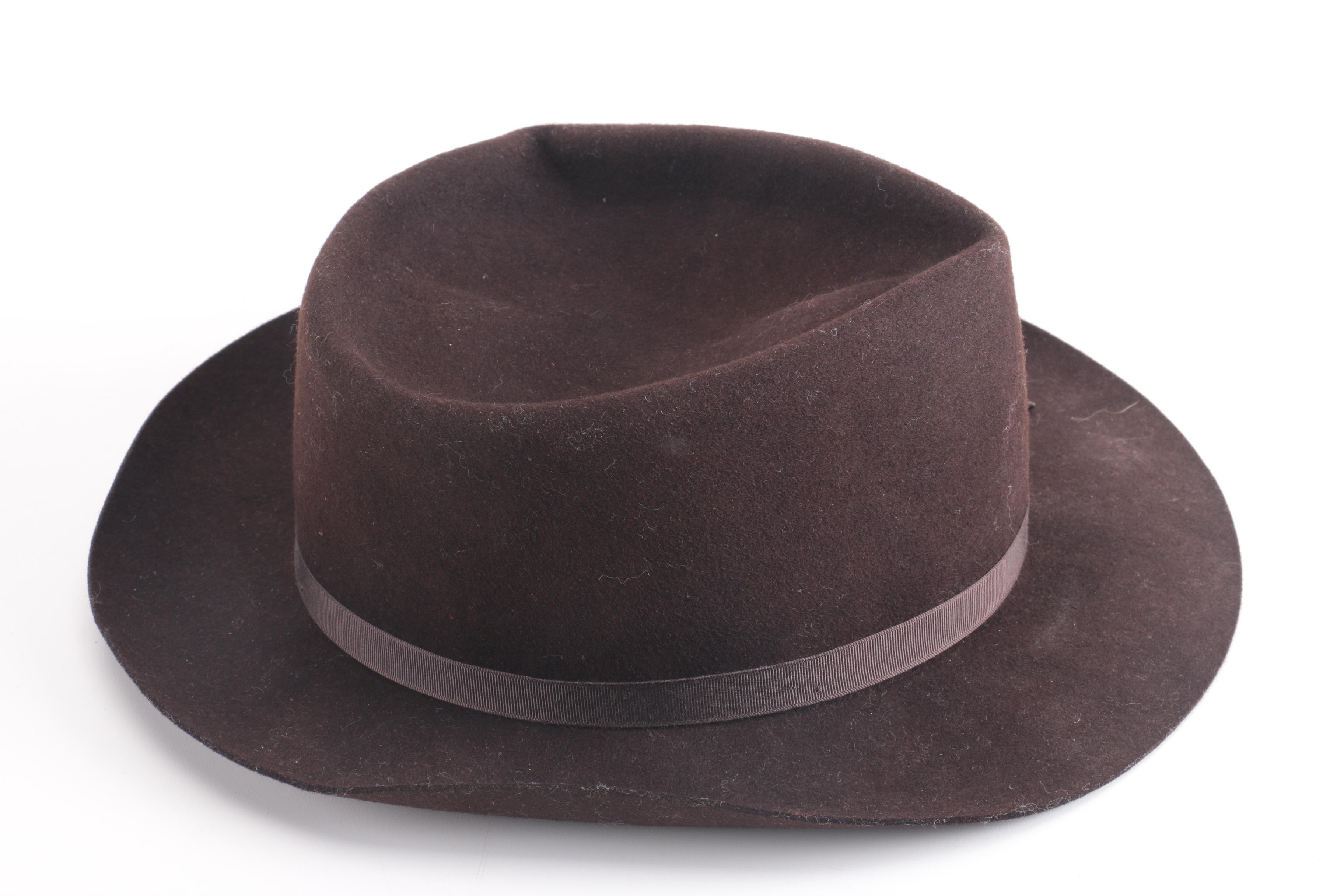 Three Black, Brown, And Gray Suede Fedoras