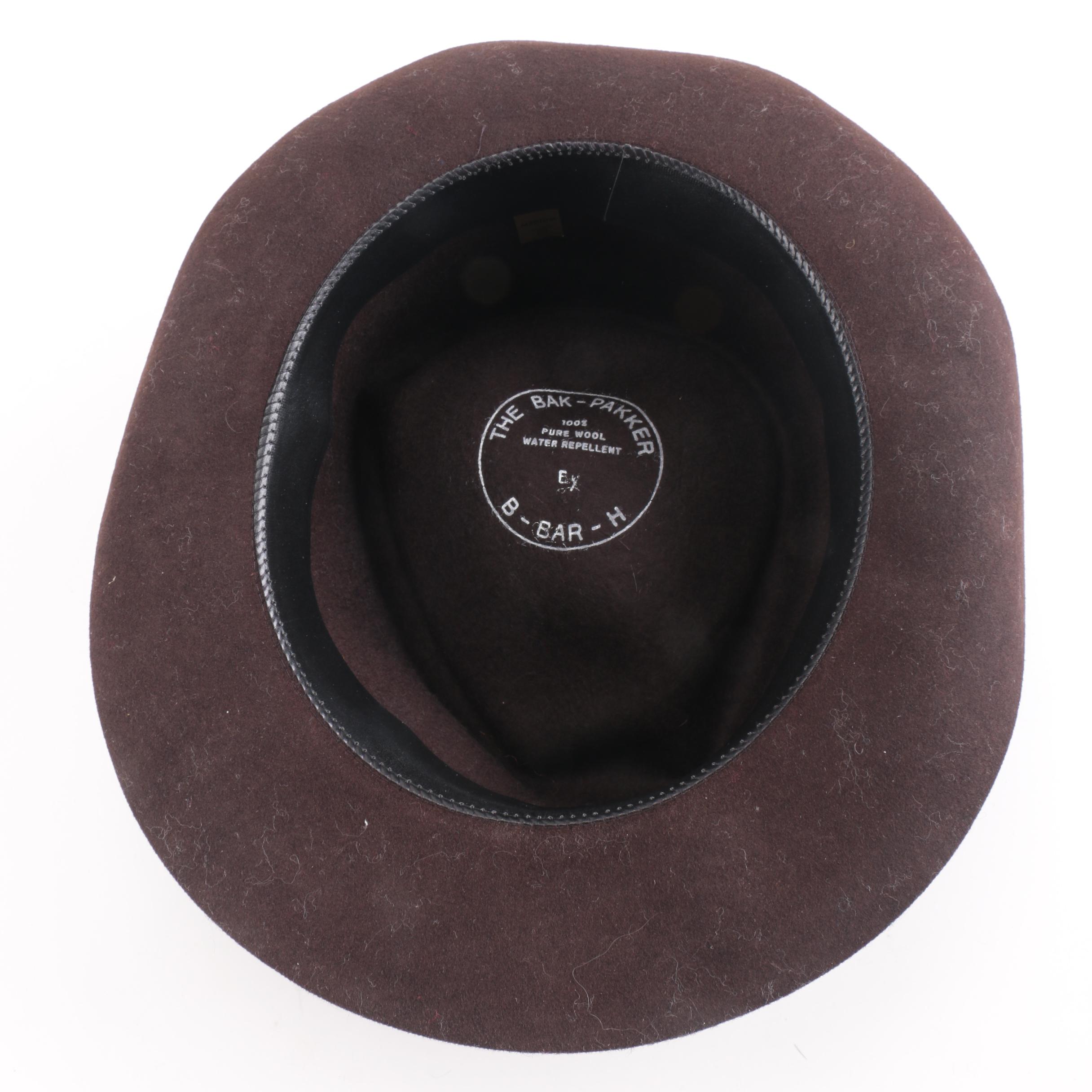 Three Black, Brown, And Gray Suede Fedoras