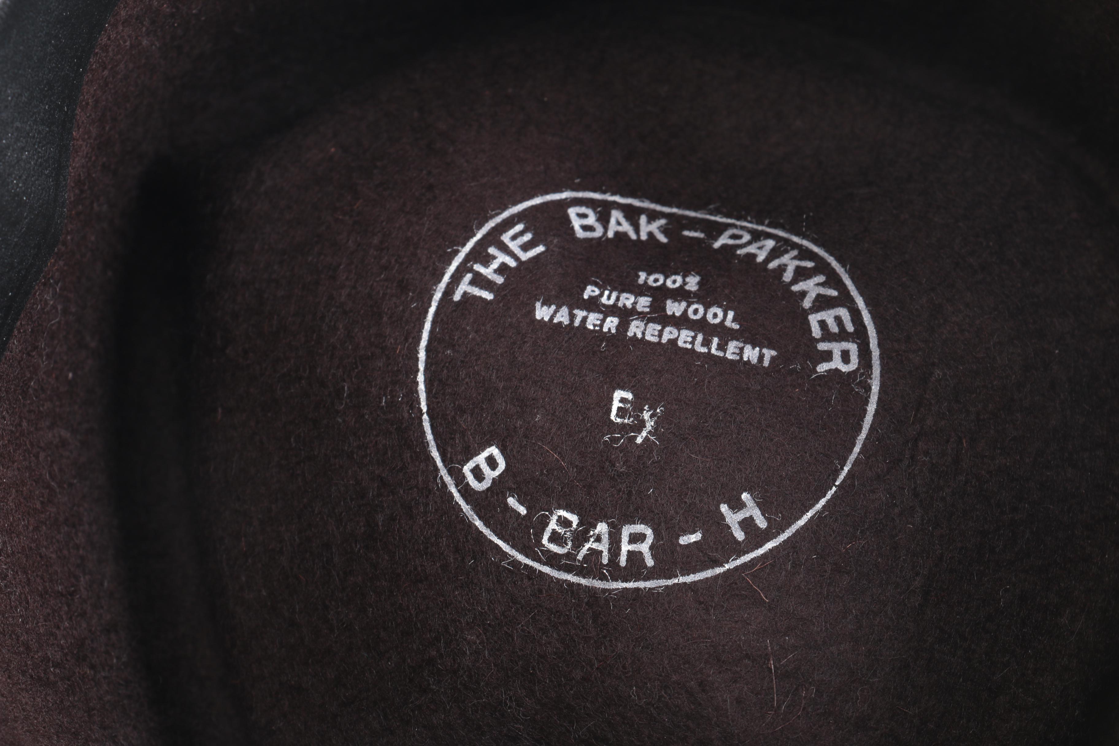 Three Black, Brown, And Gray Suede Fedoras