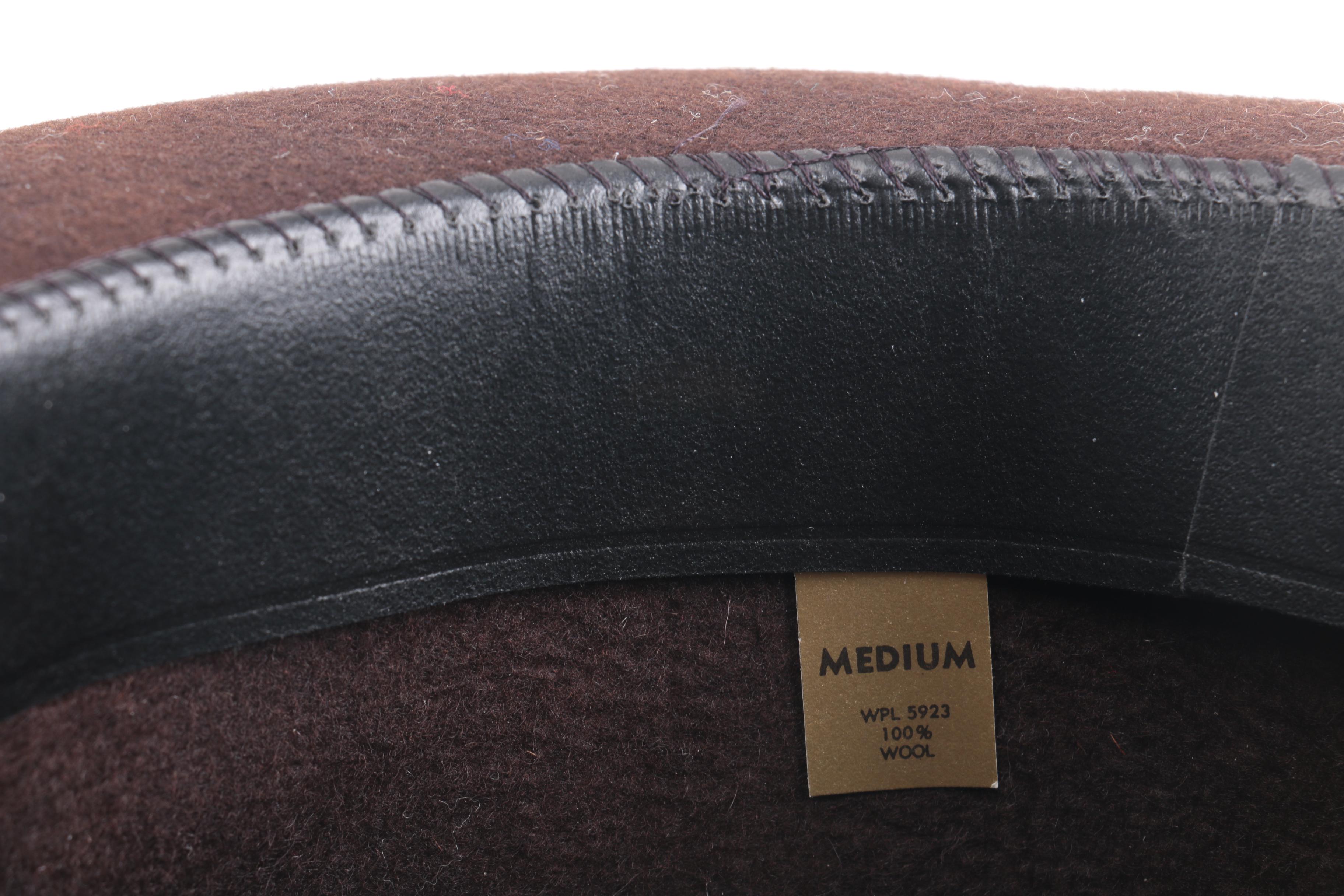 Three Black, Brown, And Gray Suede Fedoras