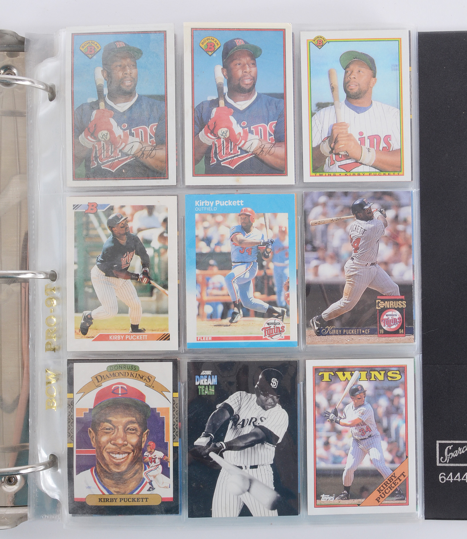 Binder of Kirby Puckett Baseball Cards