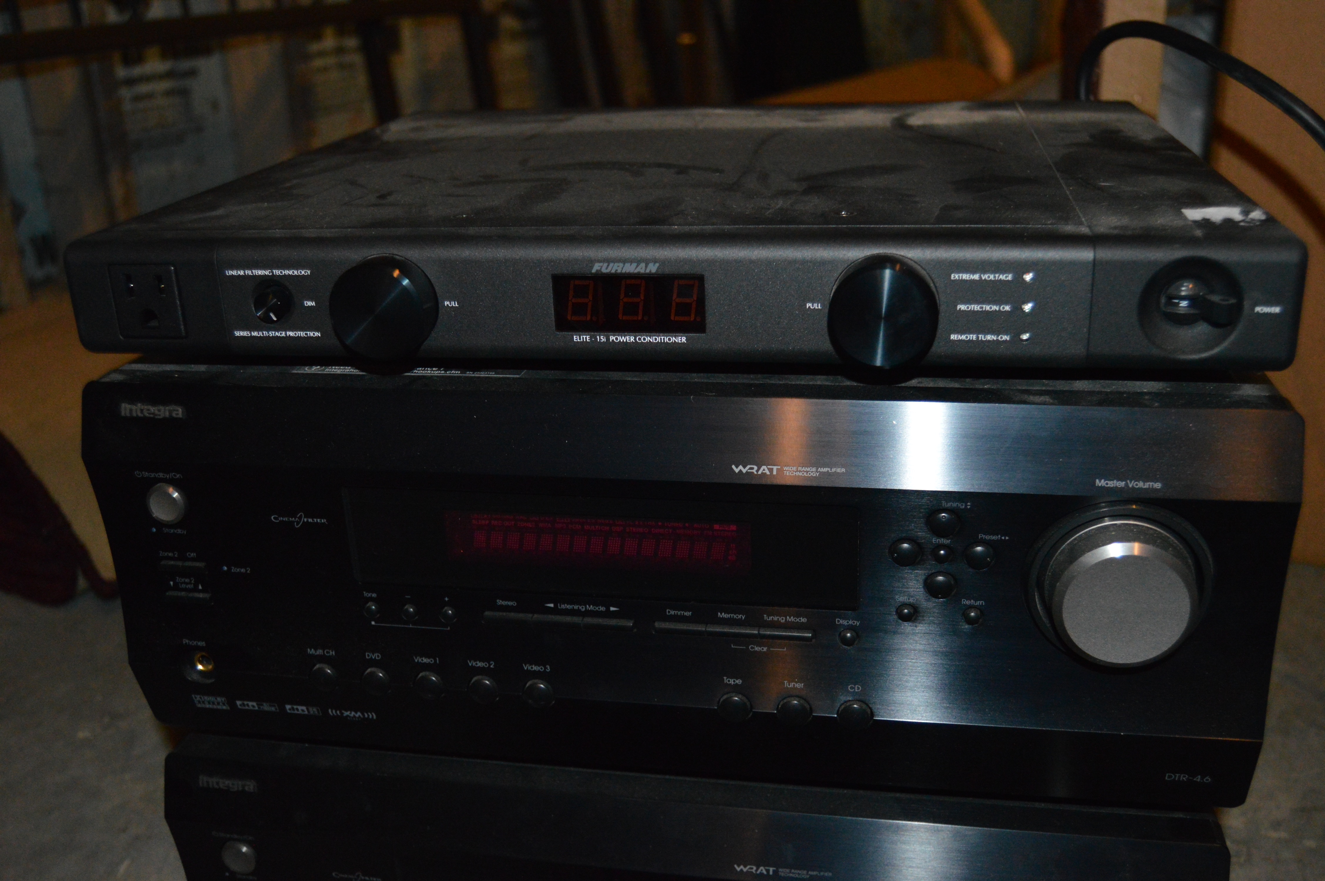 Pair of Integra Home Theaters and One Furman Power Conditioner