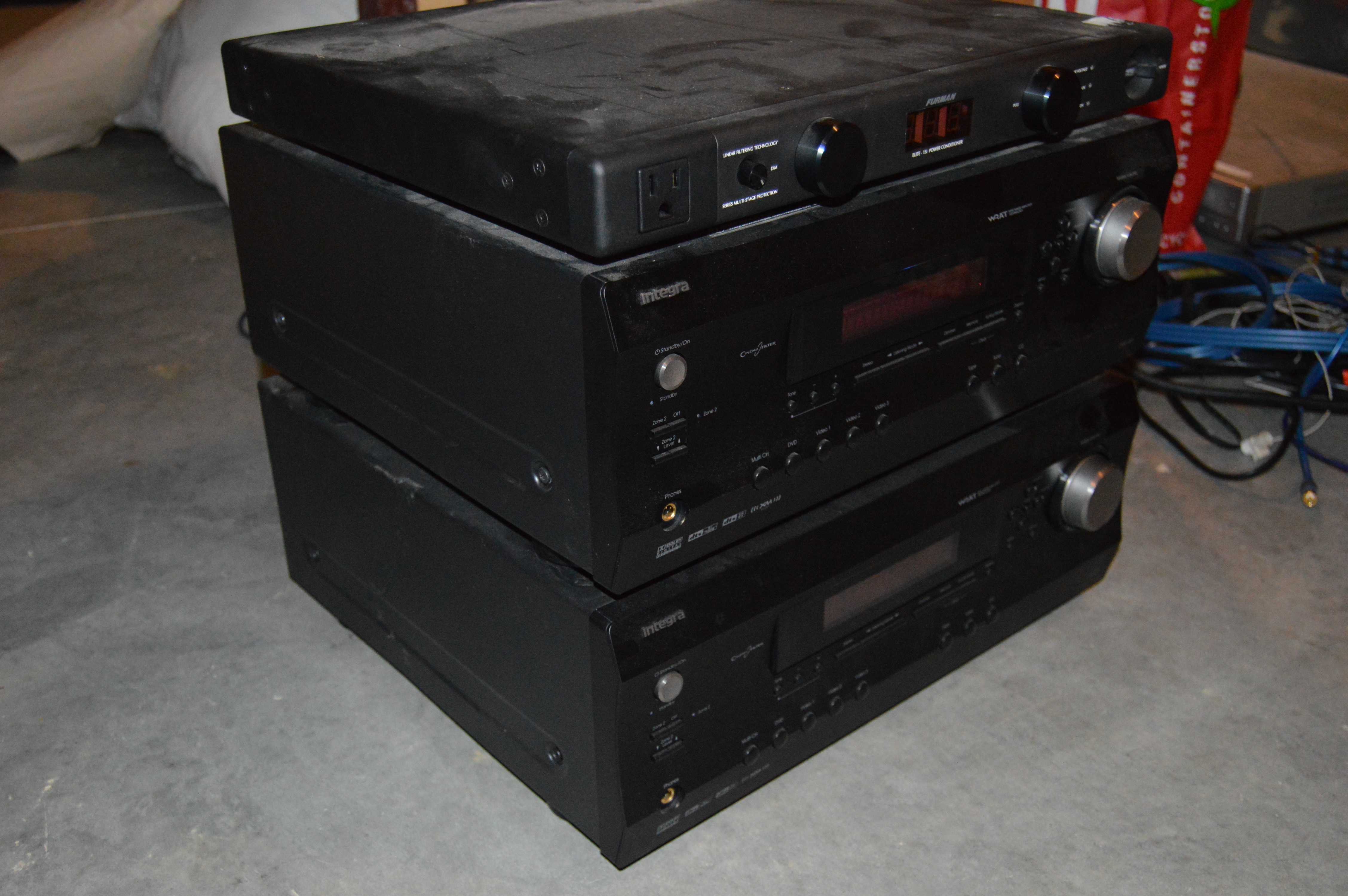 Pair of Integra Home Theaters and One Furman Power Conditioner