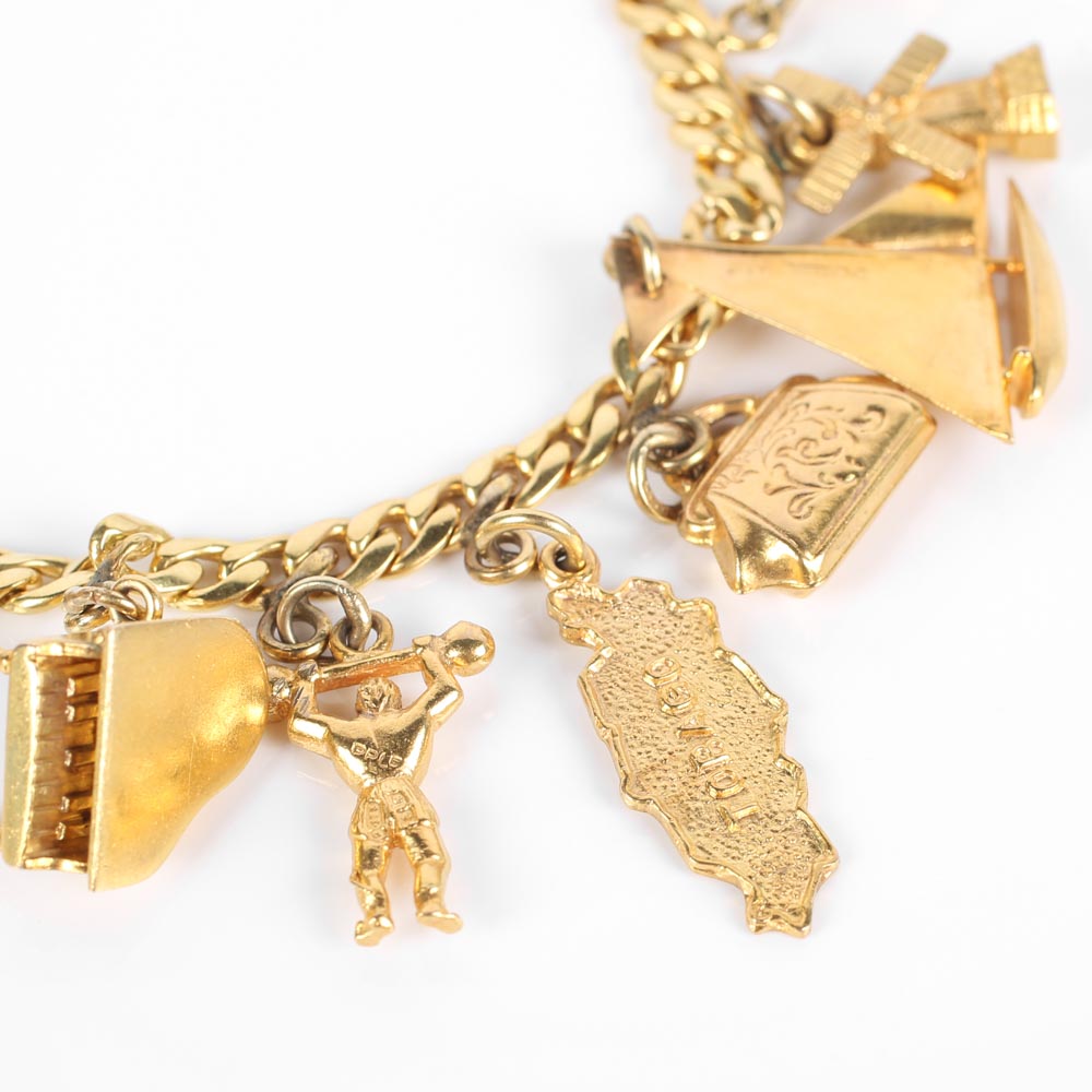 Yellow Gold Bracelet with Fifteen Charms