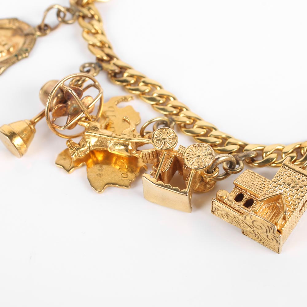 Yellow Gold Bracelet with Fifteen Charms