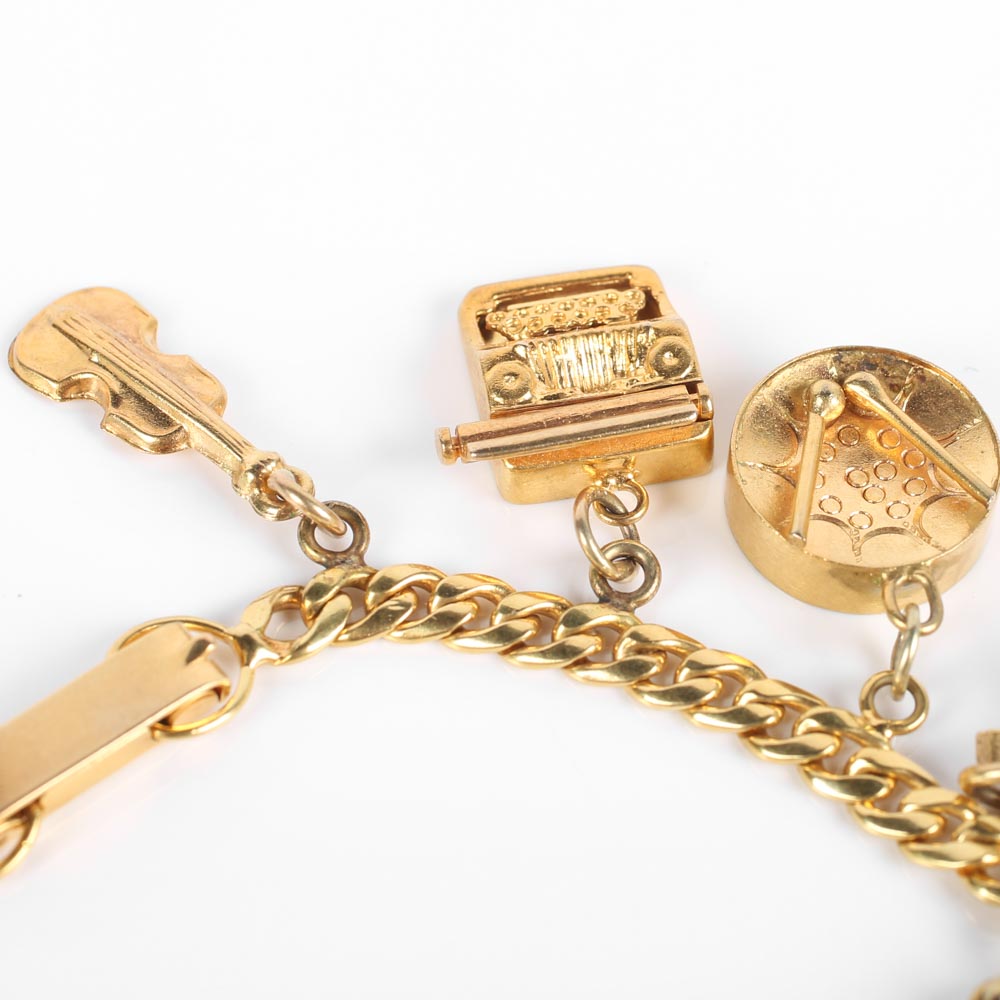 Yellow Gold Bracelet with Fifteen Charms