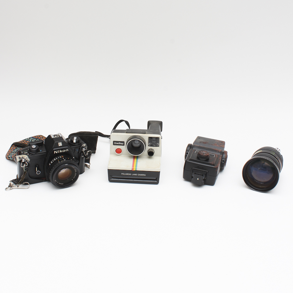 Collection of Vintage Cameras and Accessories