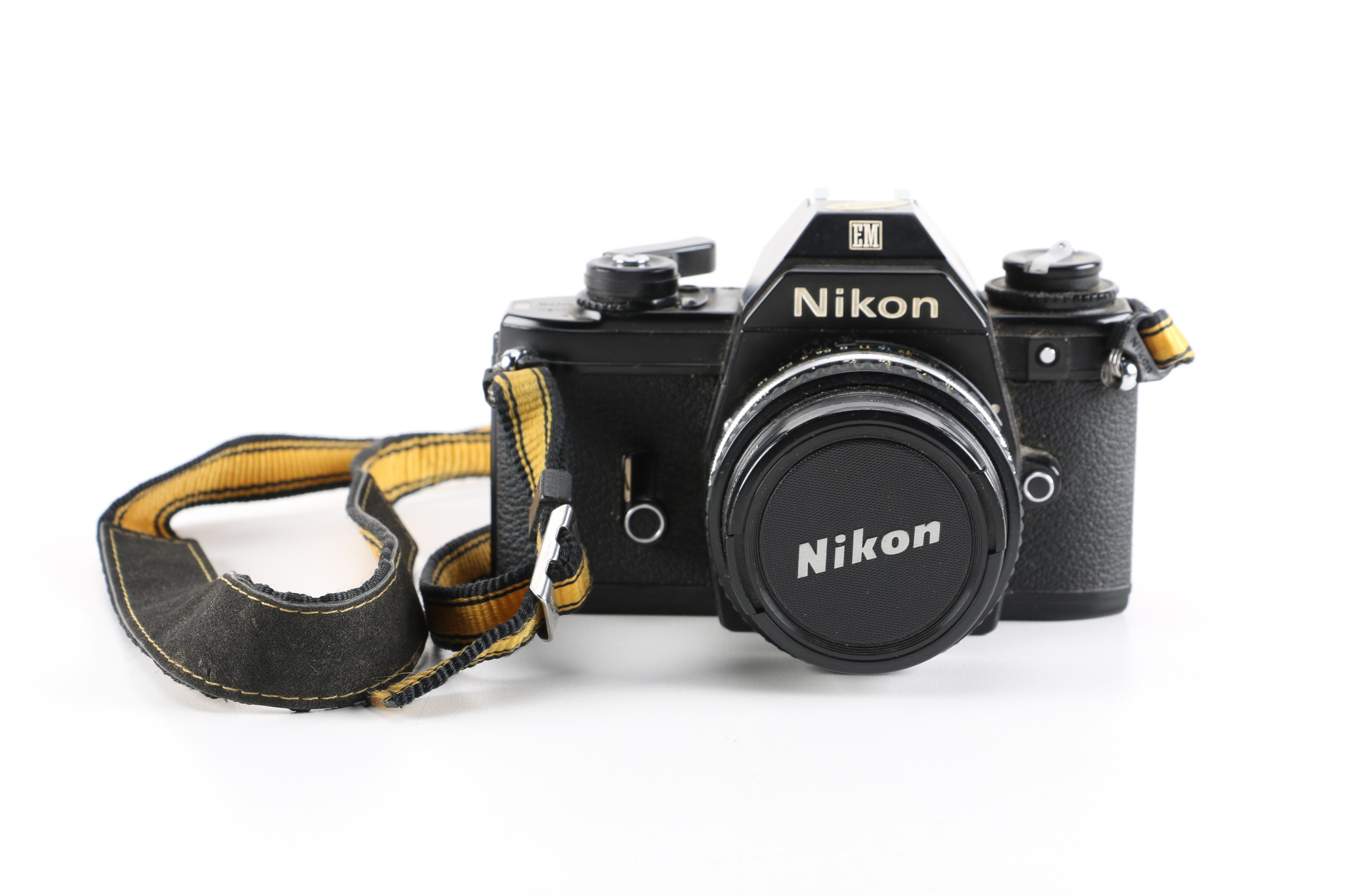 1980s Nikon EM 35mm Camera With Lens and Flash