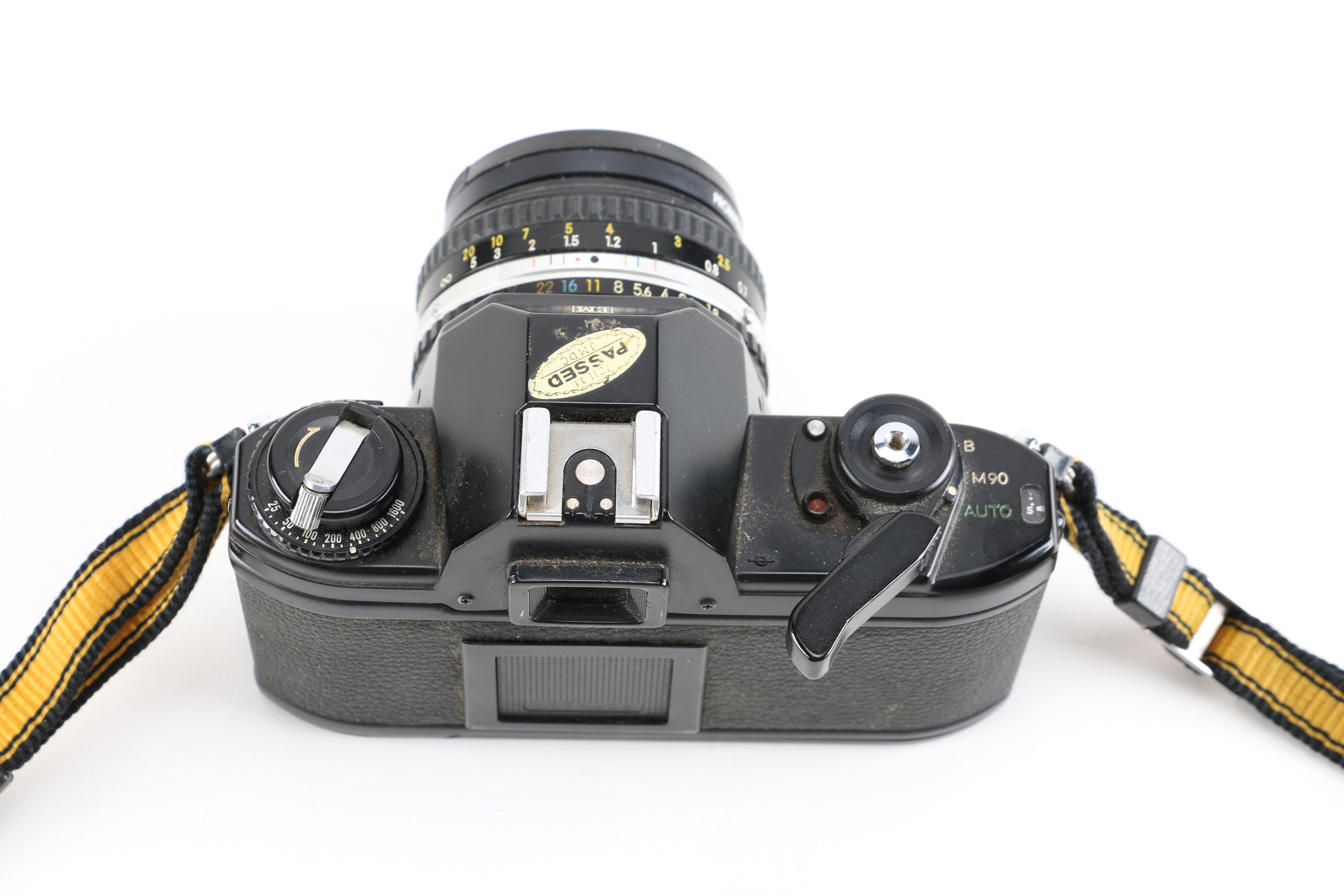 1980s Nikon EM 35mm Camera With Lens and Flash