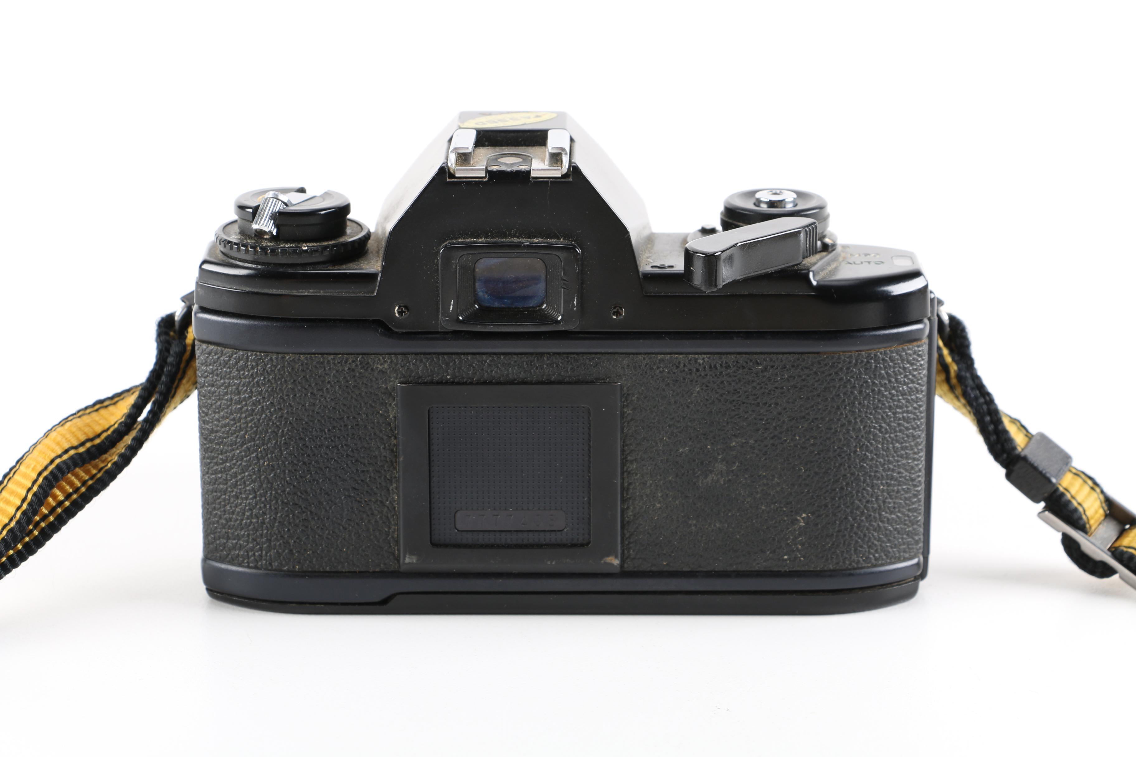 1980s Nikon EM 35mm Camera With Lens and Flash