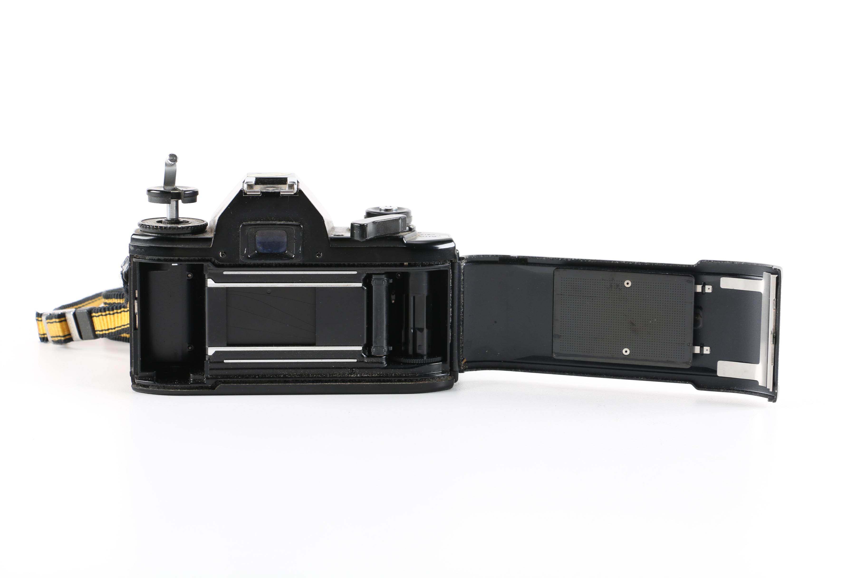 1980s Nikon EM 35mm Camera With Lens and Flash