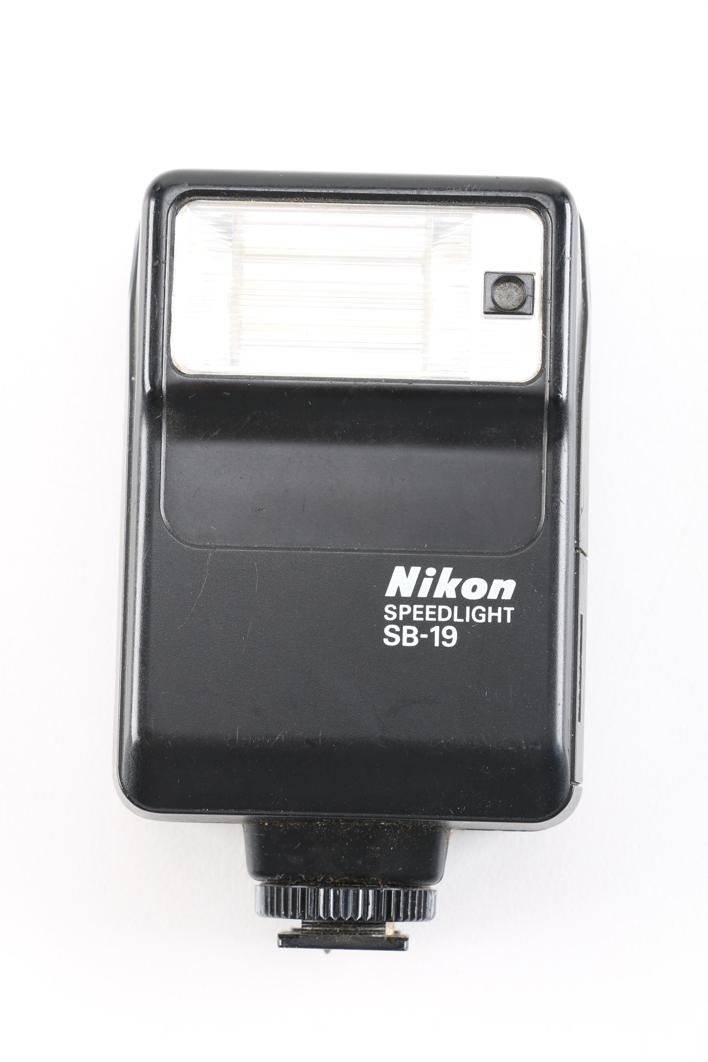 1980s Nikon EM 35mm Camera With Lens and Flash