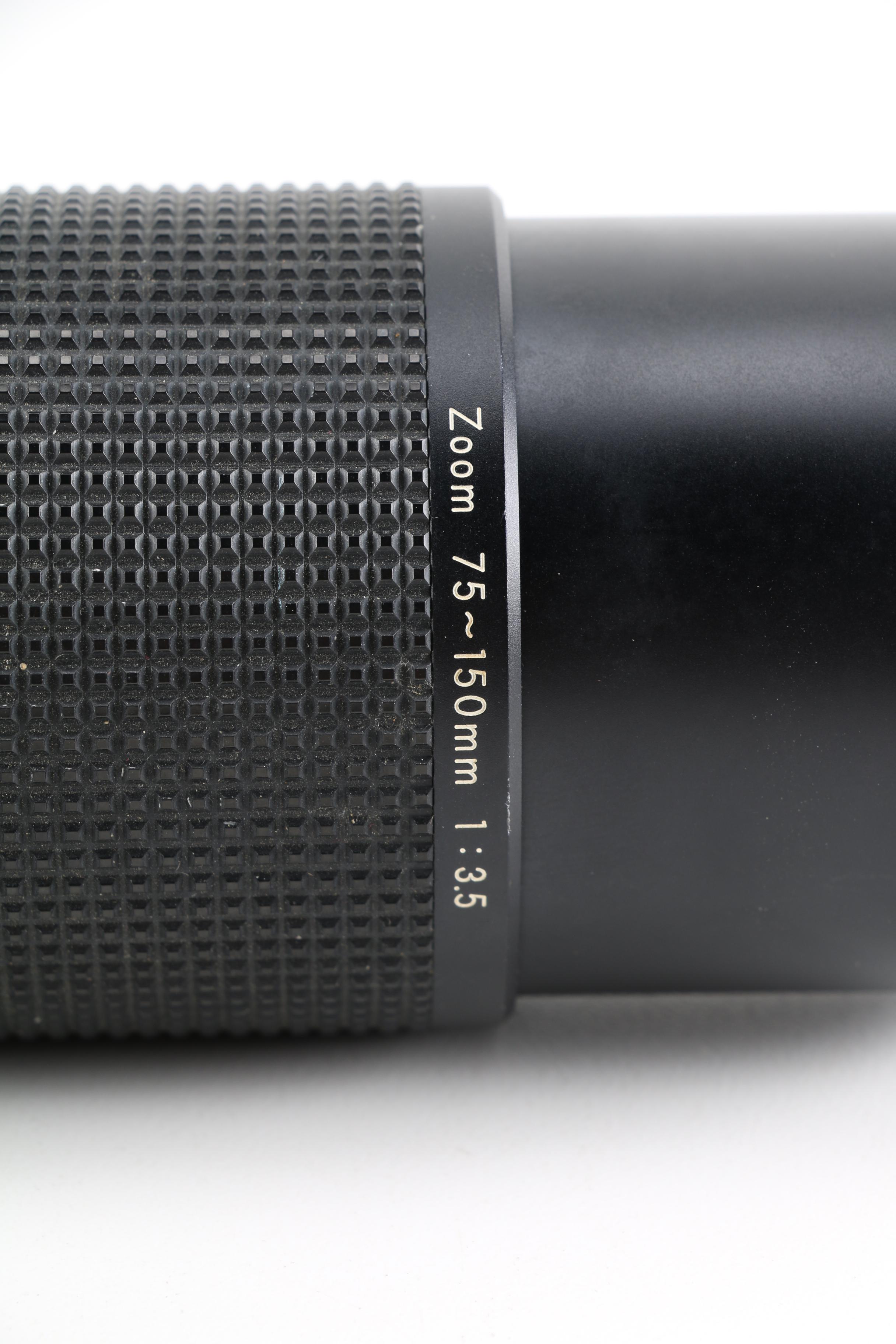 1980s Nikon EM 35mm Camera With Lens and Flash