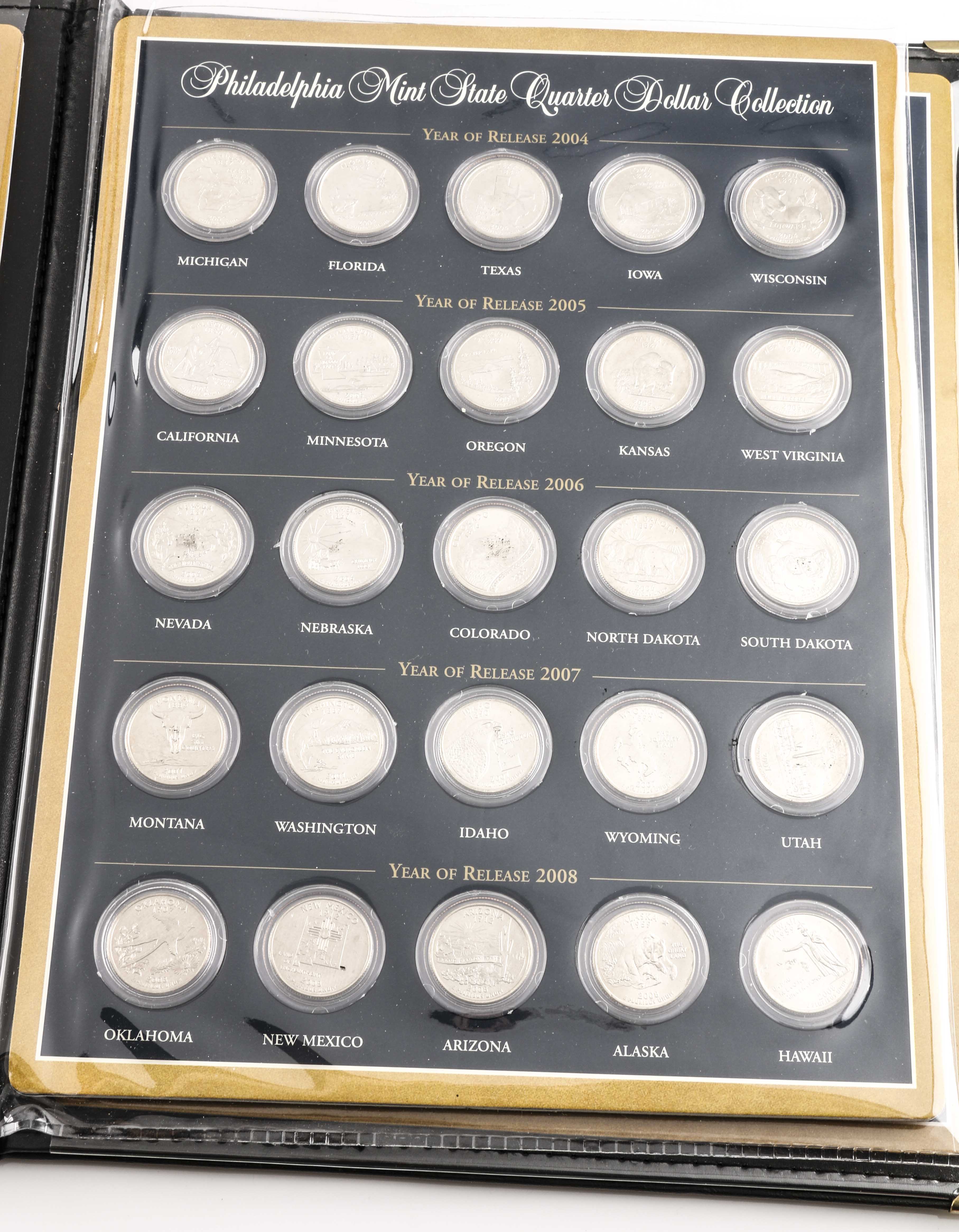 Binder of 100 U.S. Statehood Quarters