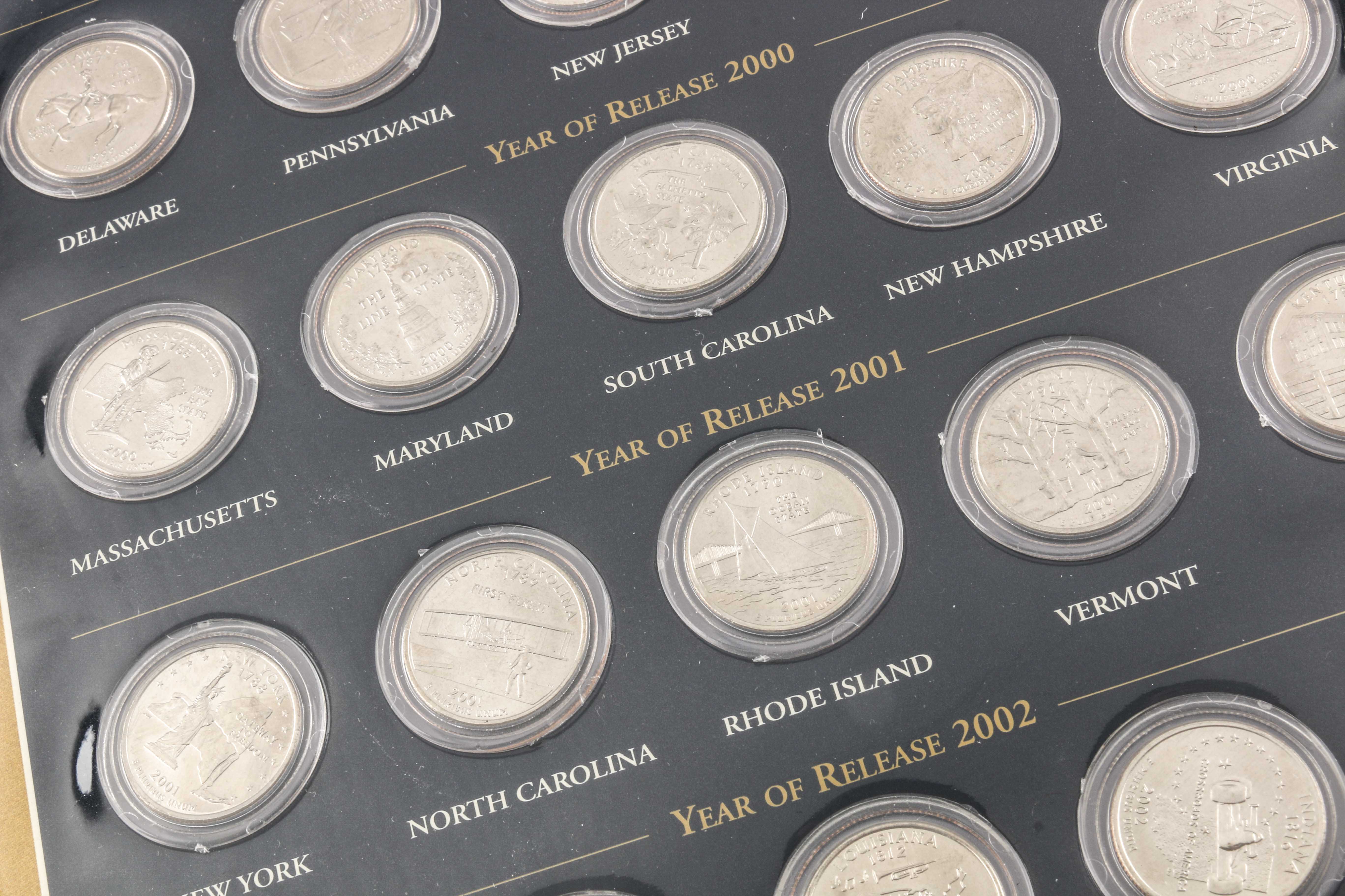 Binder of 100 U.S. Statehood Quarters