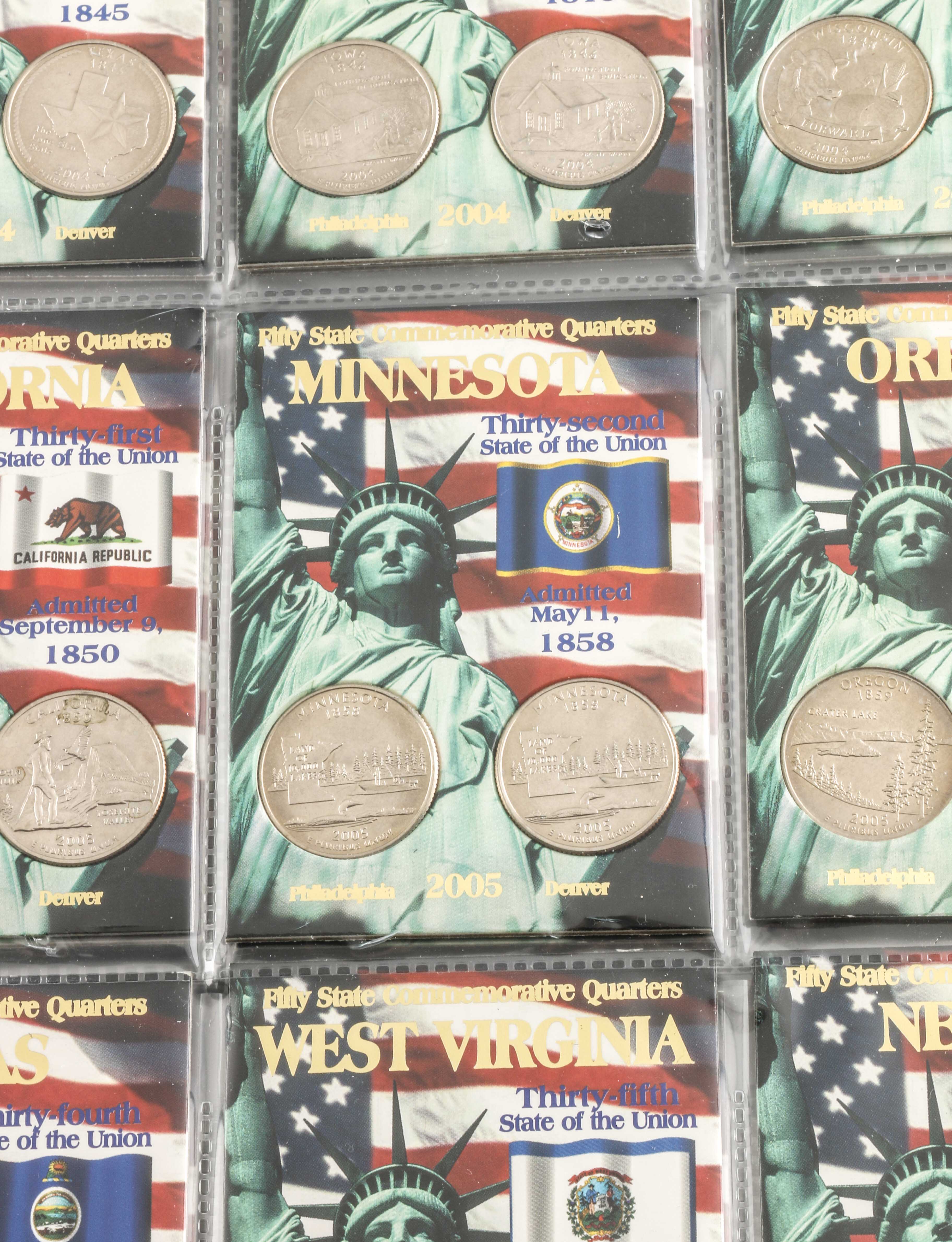 Binder of 100 U.S. Statehood Quarters