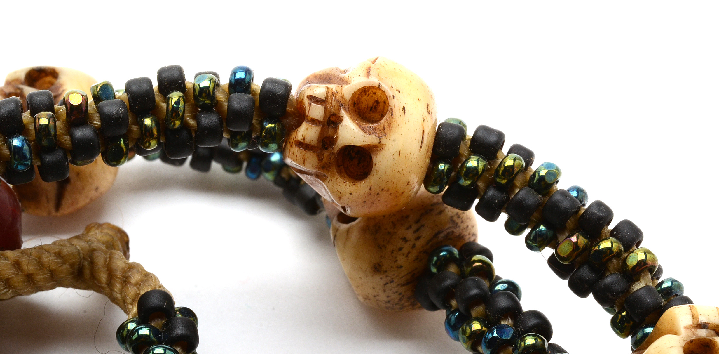 Debra Reisenbeck Rope Necklace with Skull Beads