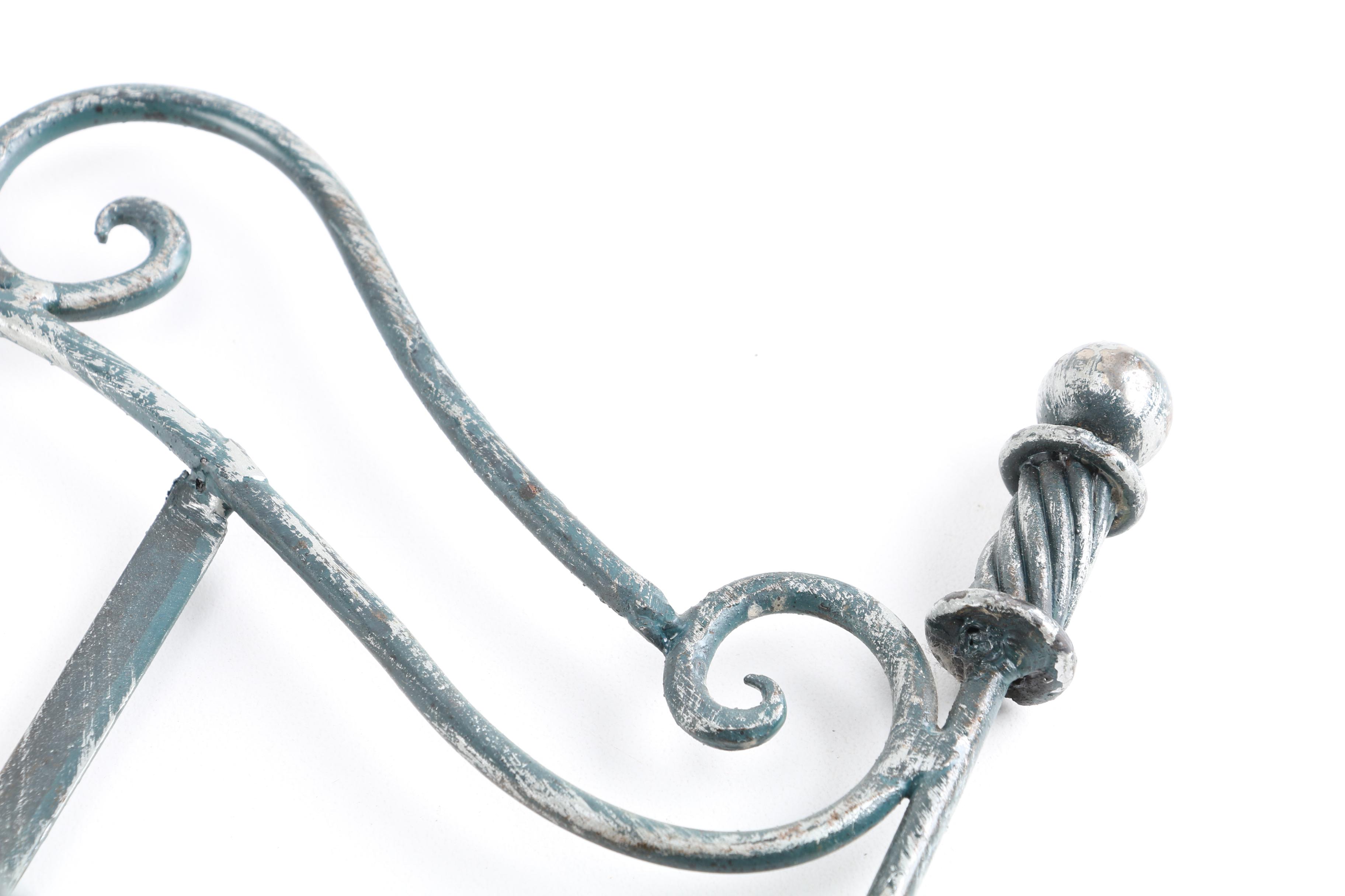 Scrolled Metal and Wicker Magazine Rack