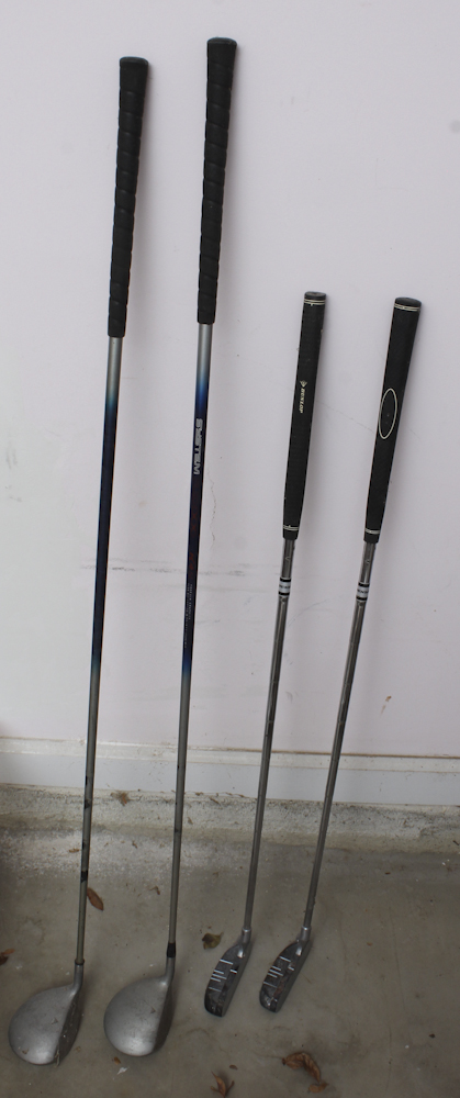 Assortment of Golf Clubs and Accessories