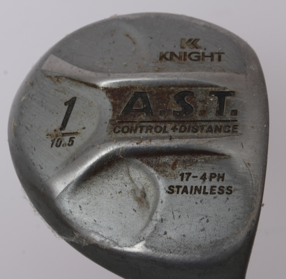 Assortment of Golf Clubs and Accessories