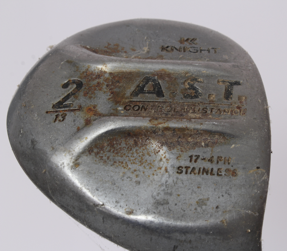 Assortment of Golf Clubs and Accessories