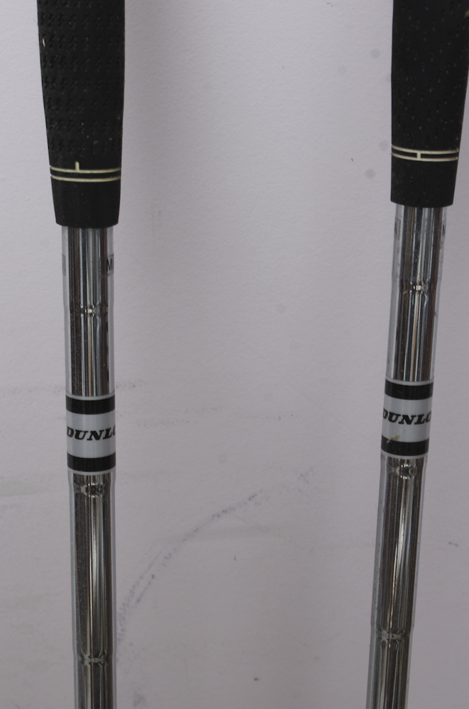 Assortment of Golf Clubs and Accessories