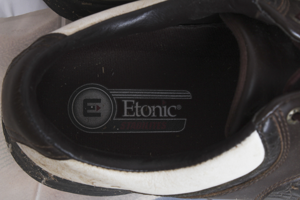 Assortment of Golf Clubs and Accessories