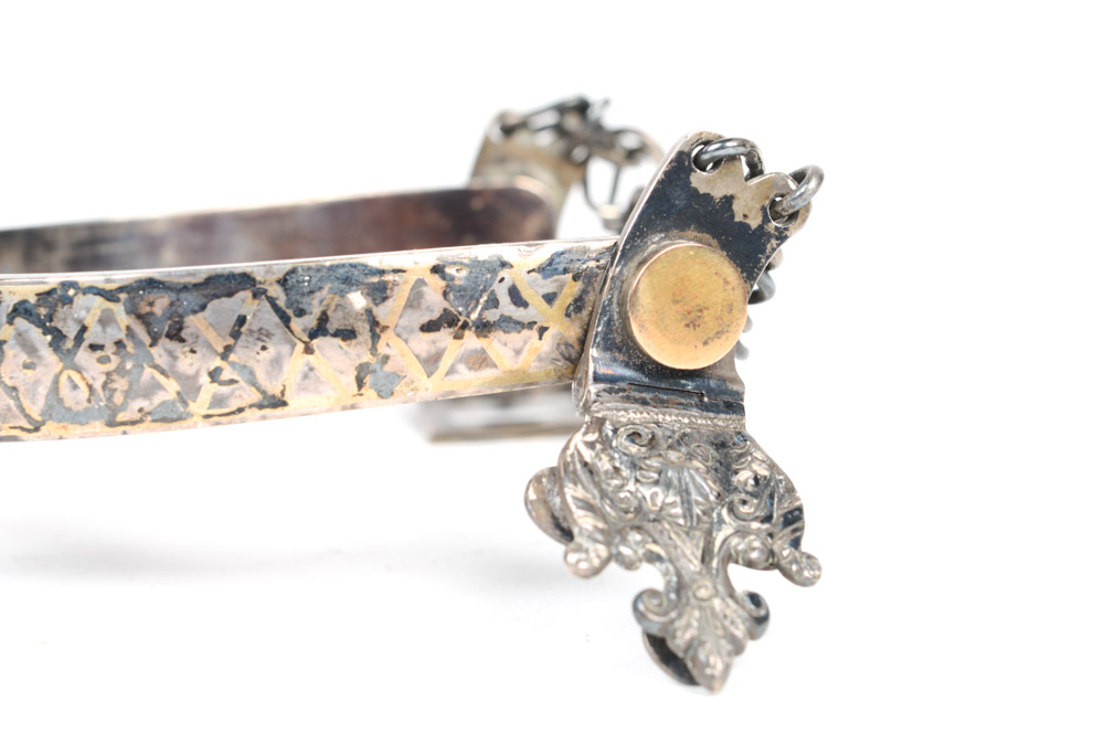Antique Metal Spurs with Silver Inlay
