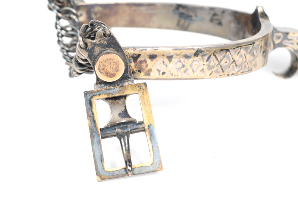Antique Metal Spurs with Silver Inlay