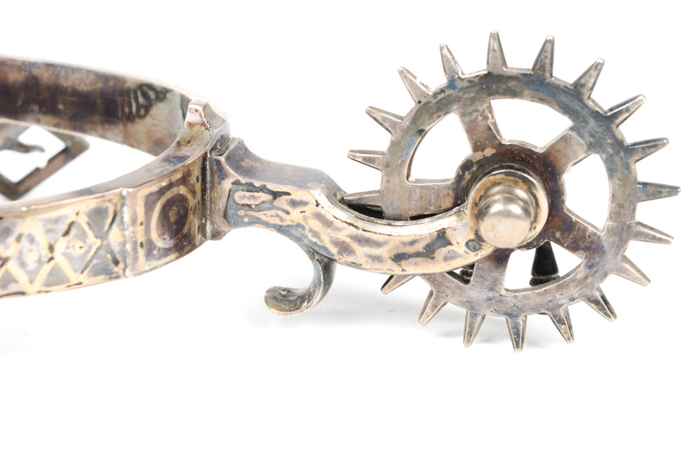 Antique Metal Spurs with Silver Inlay