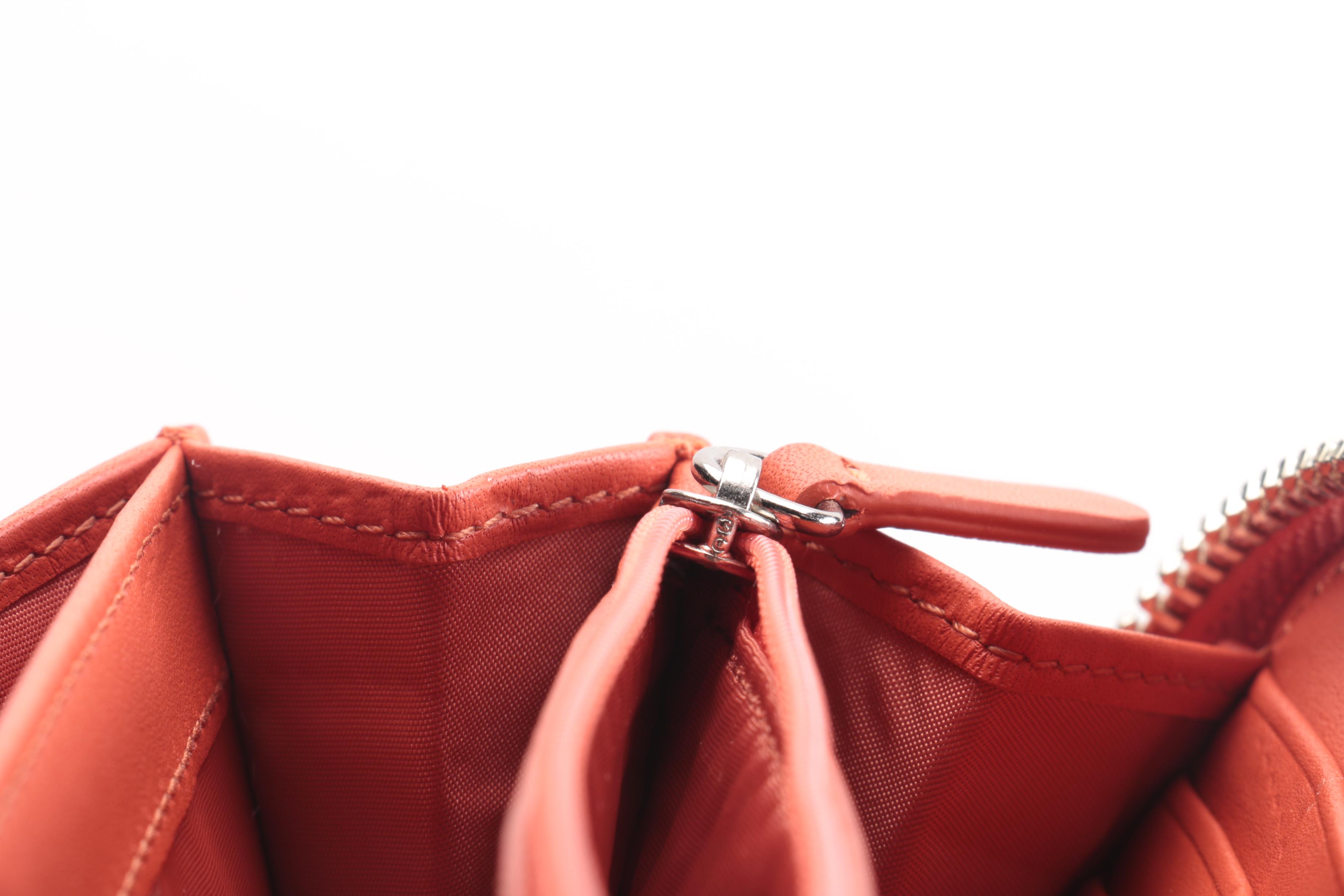 Coach Burnt Orange Eyelet Wallet