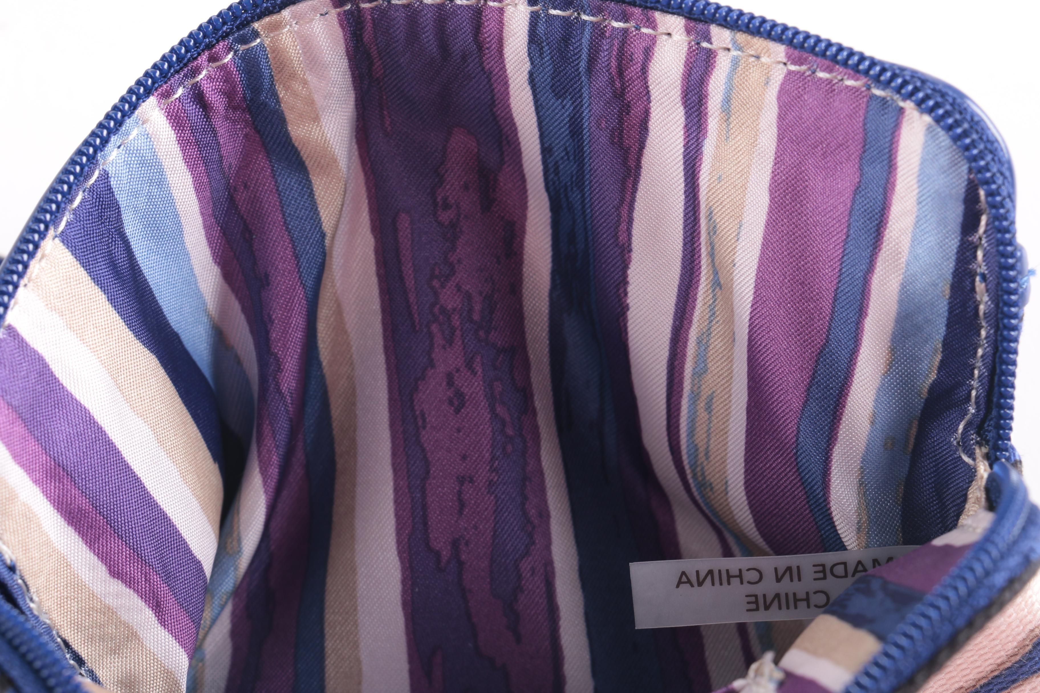 Coach Floral Wristlets