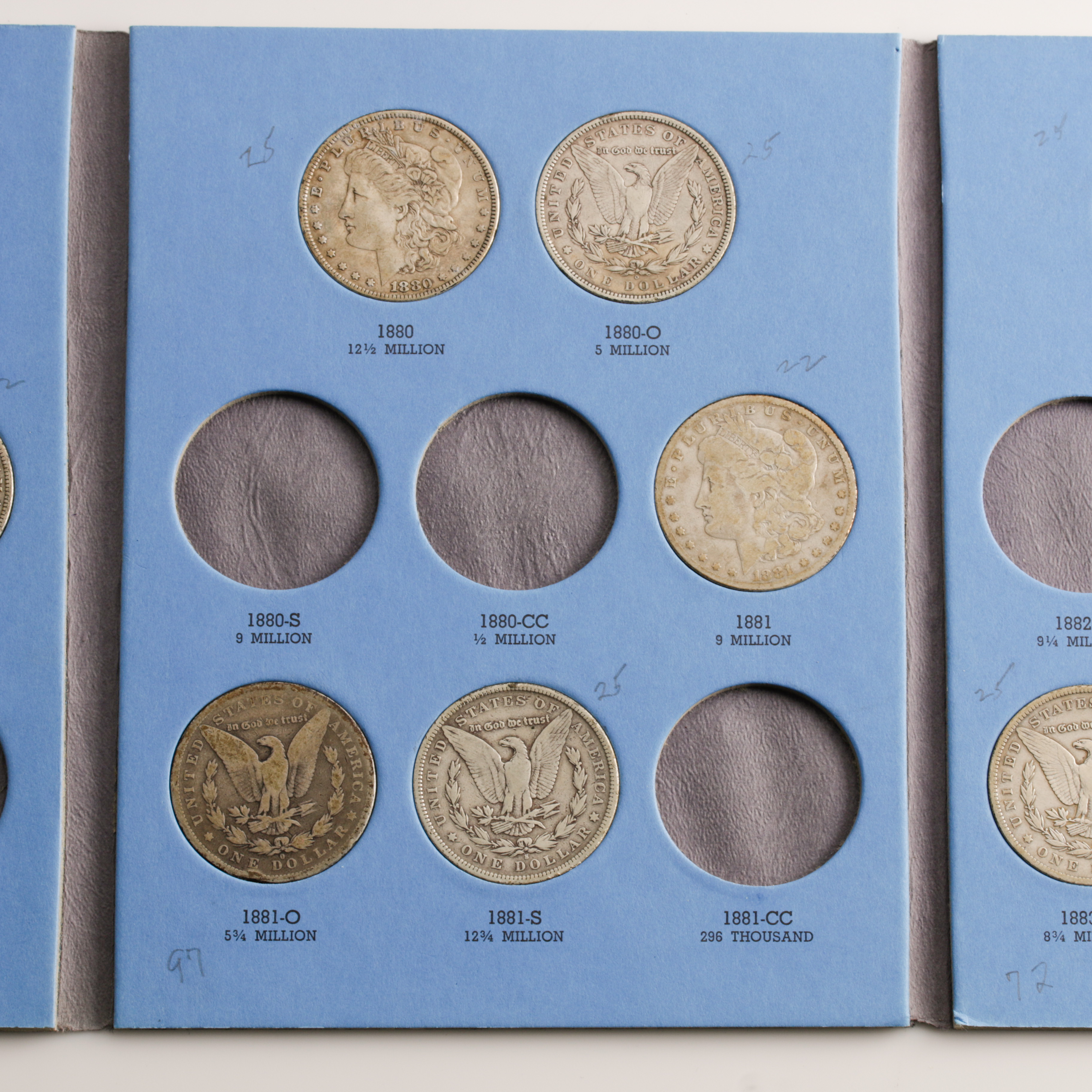 Group of 12 Silver Morgan Dollars in a Whitman Coin Folder Ranging in Age from 1878 to 1883