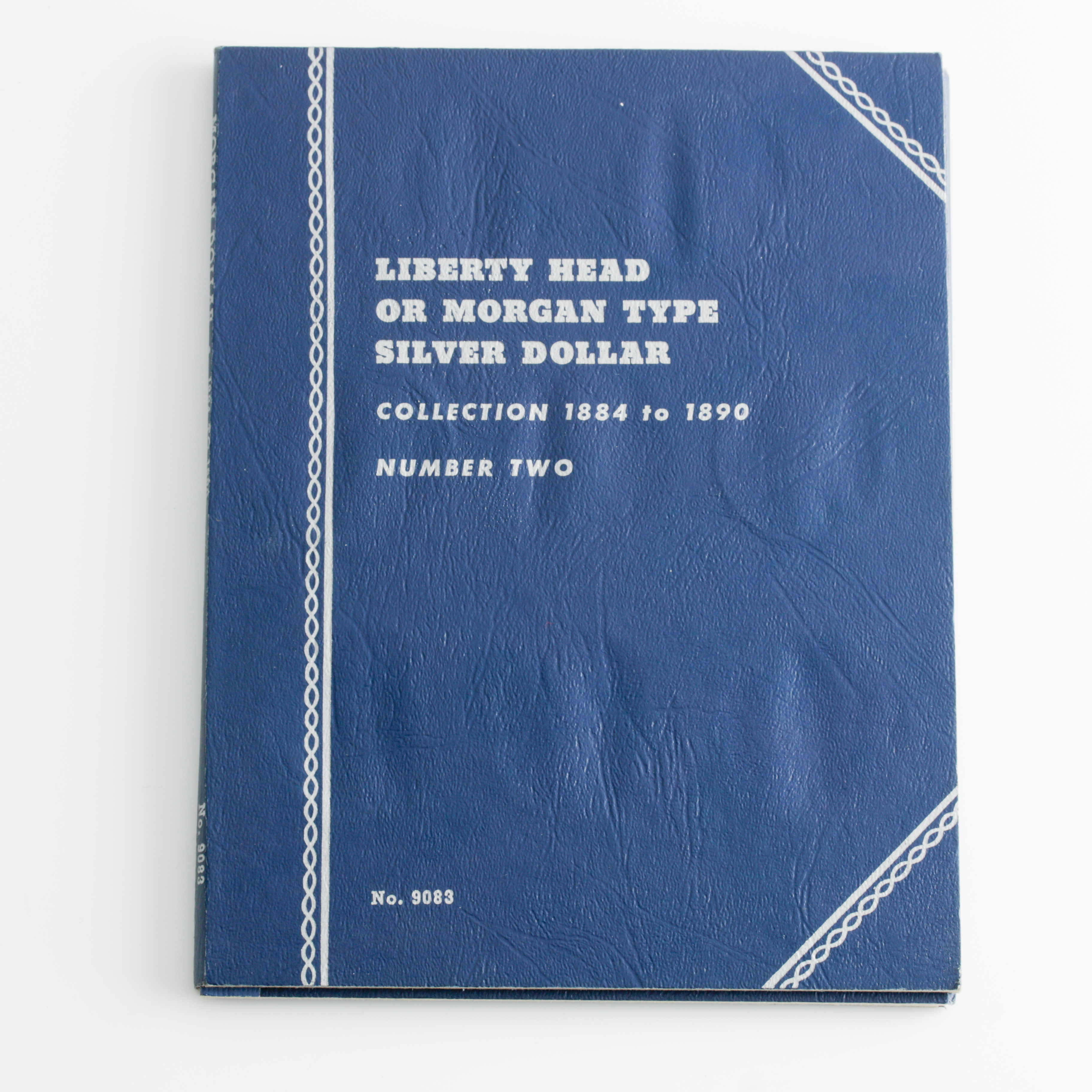 Group of 9 Silver Morgan Dollars in a Whitman Coin Folder Ranging in Age from 1884 to 1890