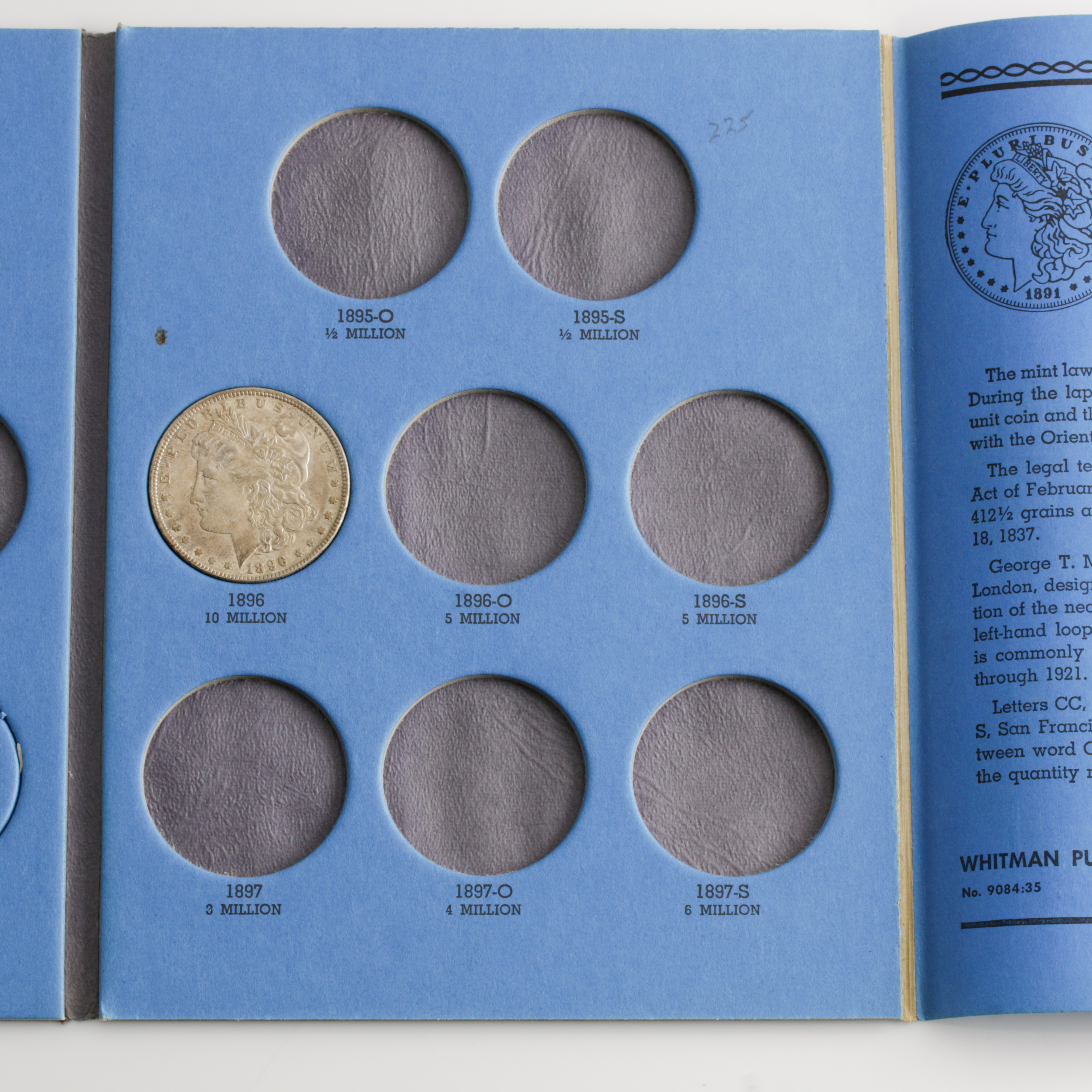 Group of 4 Silver Morgan Dollars in a Whitman Coin Folder Ranging in Age from 1891 to 1896
