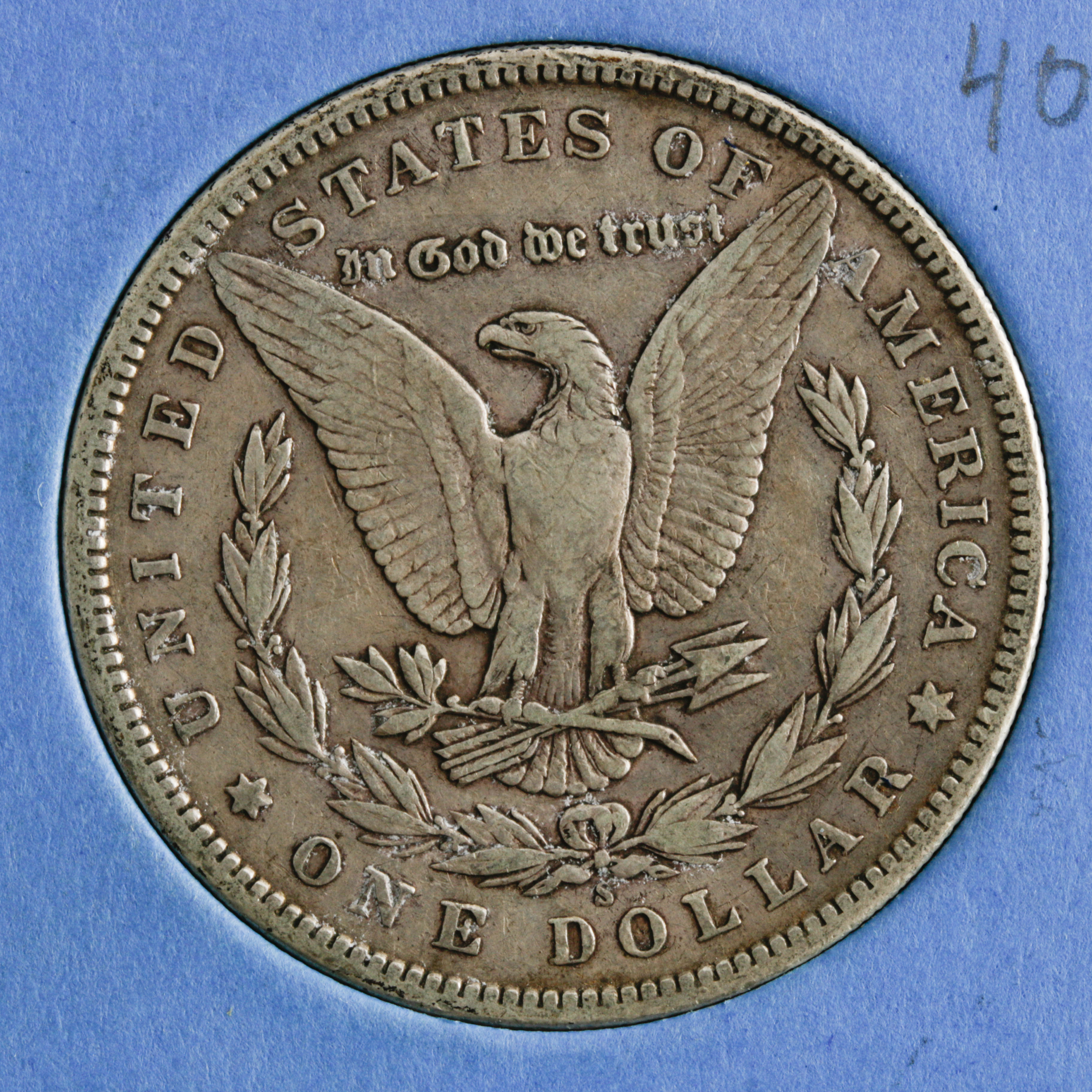 Group of 11 Silver Morgan Dollars in a Whitman Coin Folder Ranging in Age from 1898 to 1921