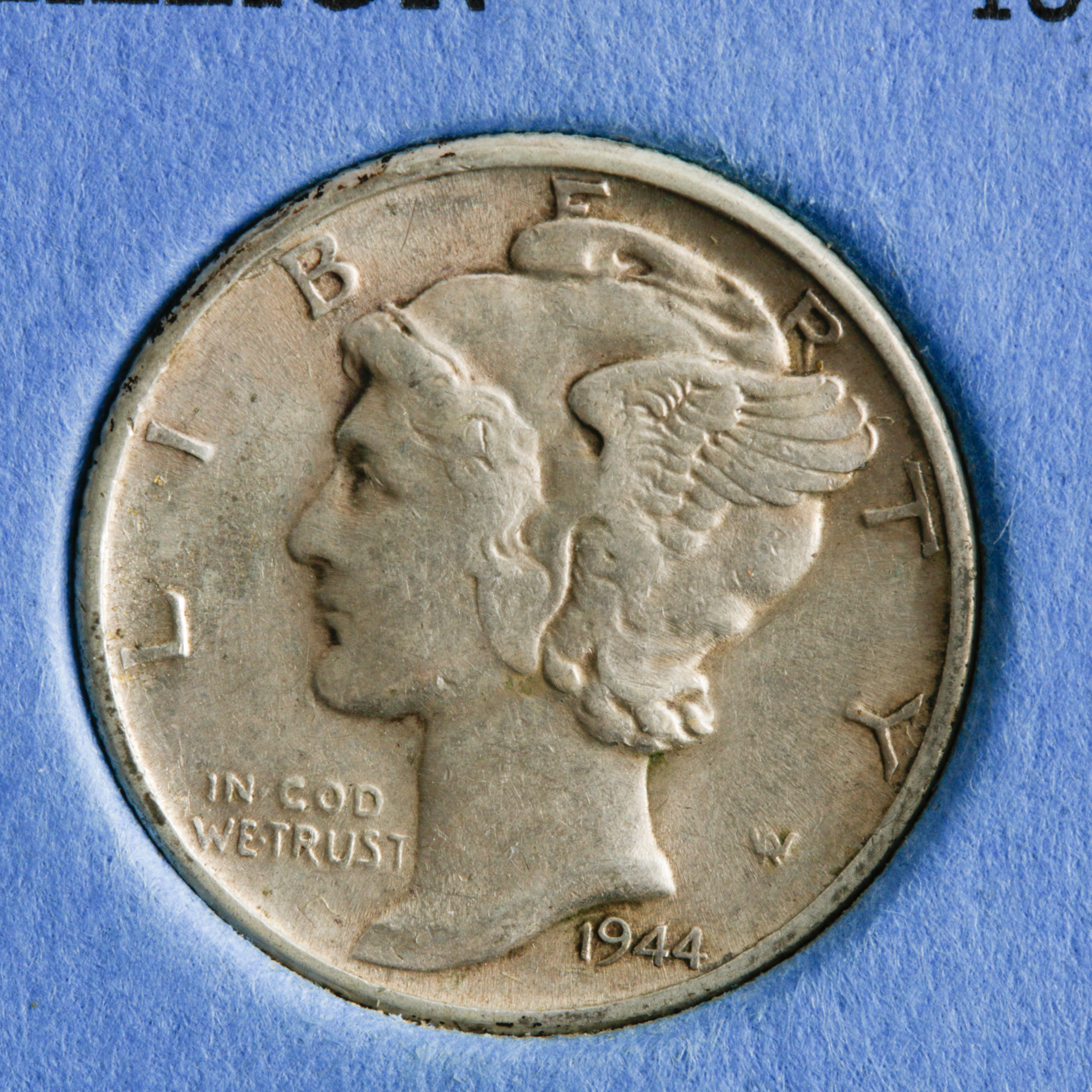 Group of 56 Silver Mercury Dimes in a Whitman Coin Folder Ranging in Age from 1916 to 1945